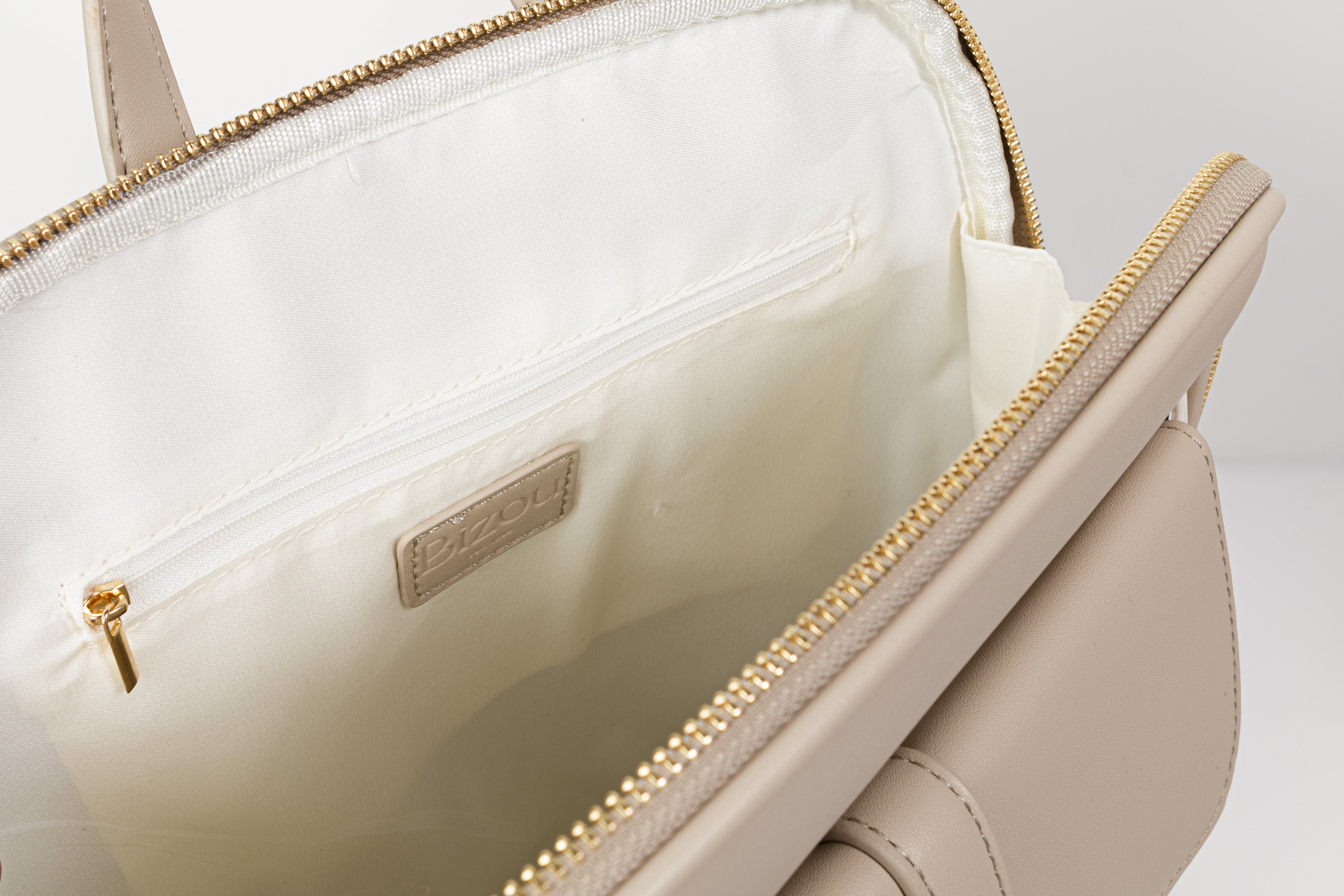 Sac à dos beige et ivoire