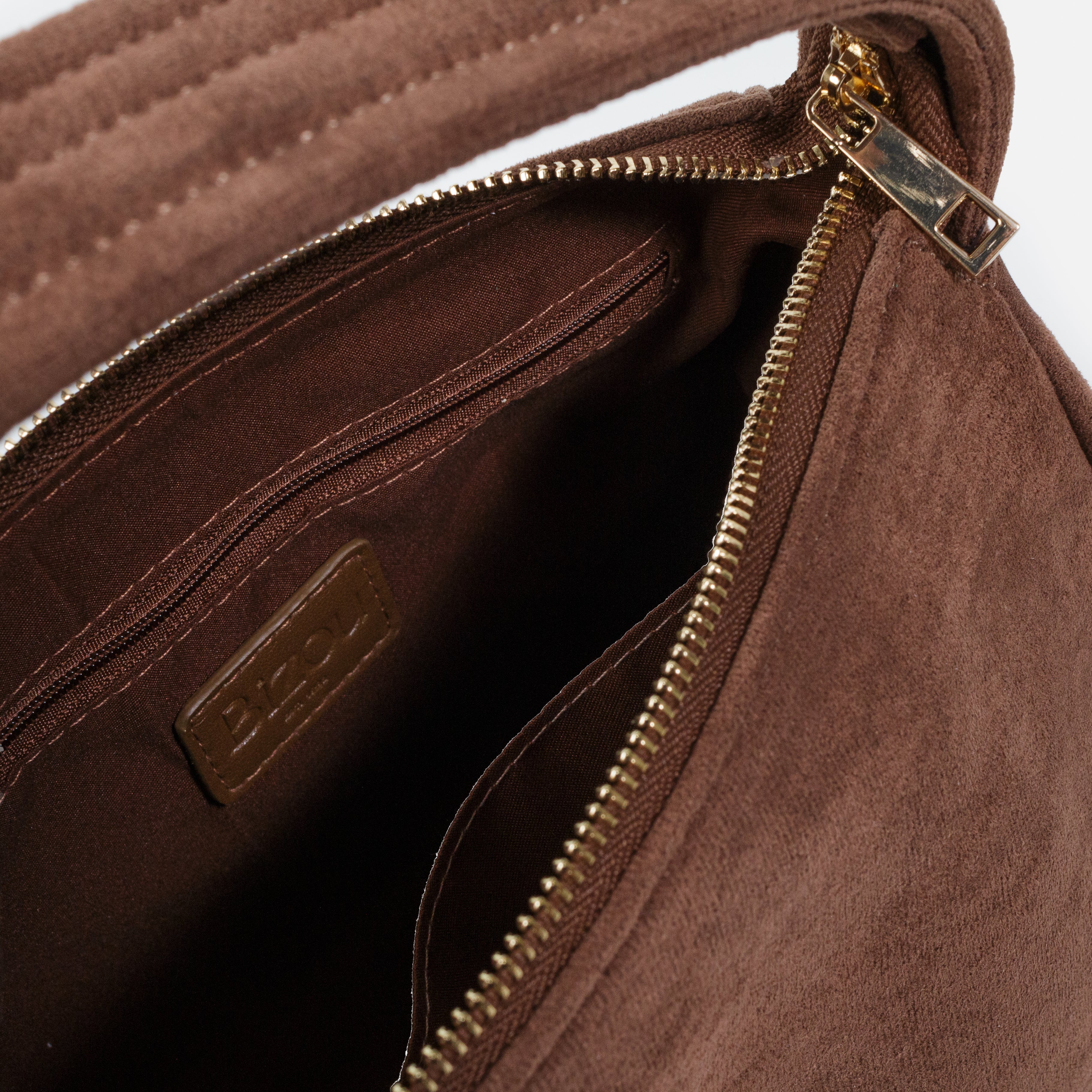 Pale brown handbag with a suede-like finish
