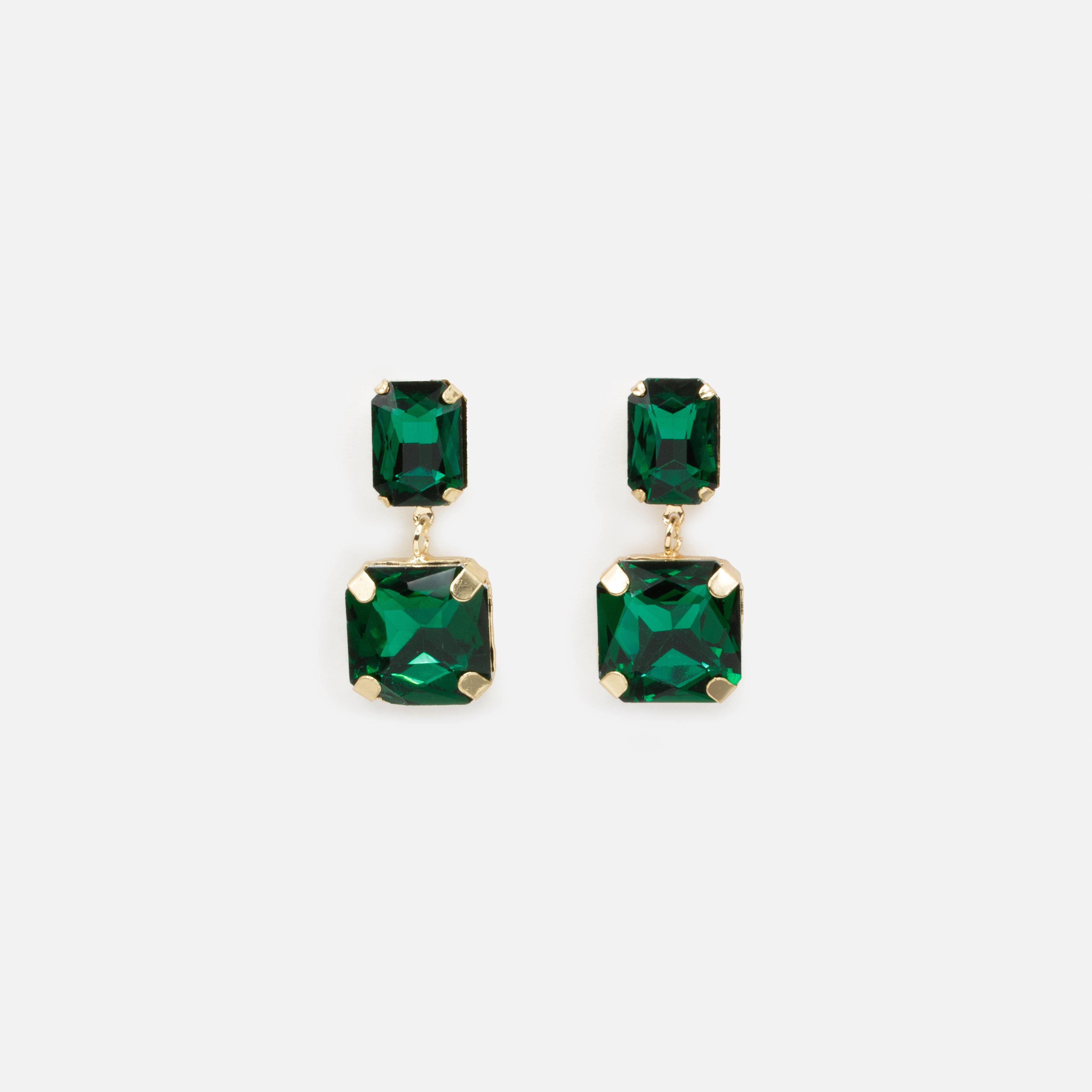 Ensemble collier et boucles d'oreilles dorées avec pierres émeraude