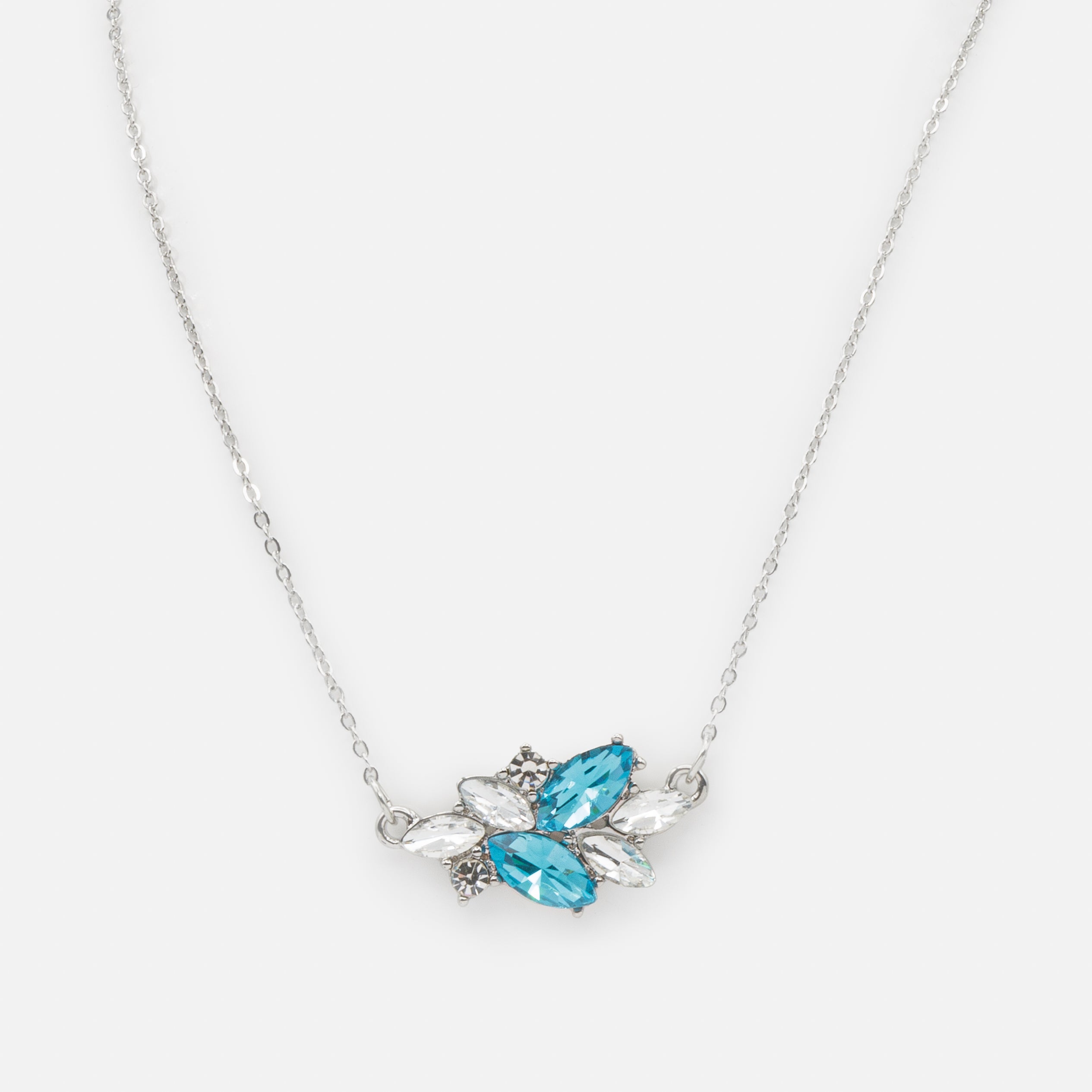 Ensemble collier et boucles d'oreilles pendantes argentés avec pierres blanches et turquoise