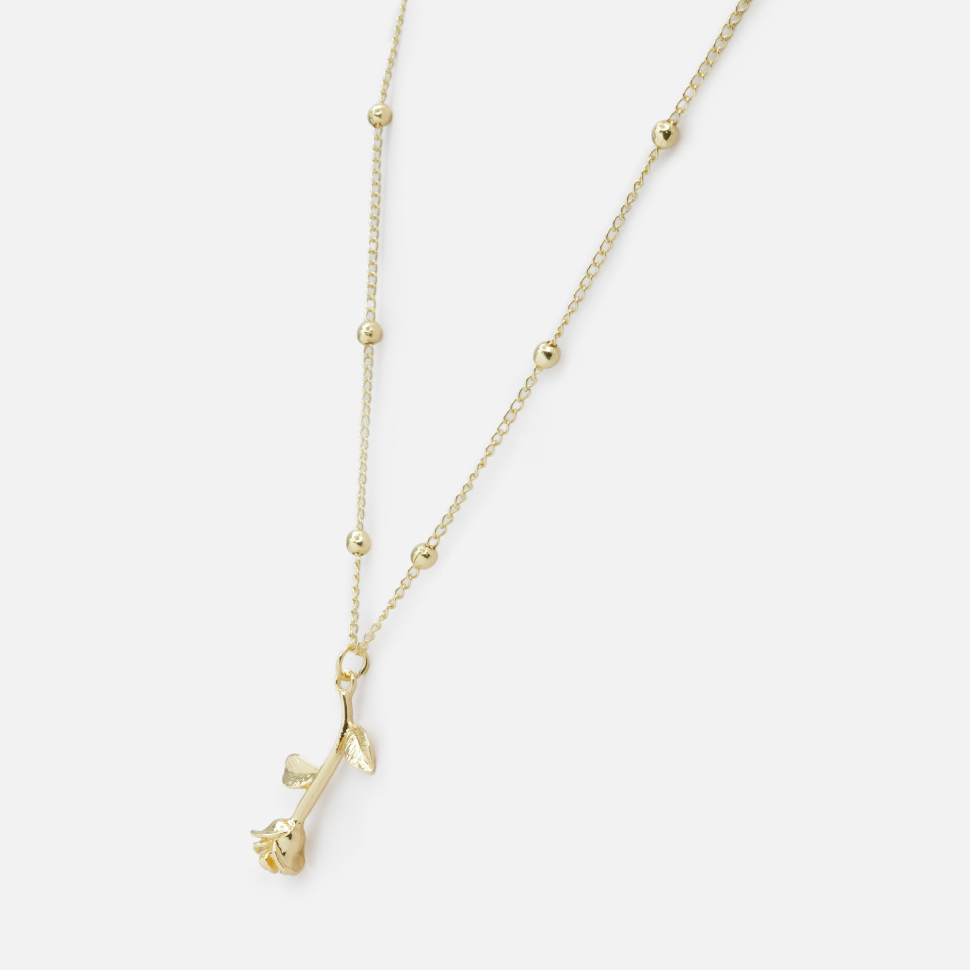 Collier doré rose séchée