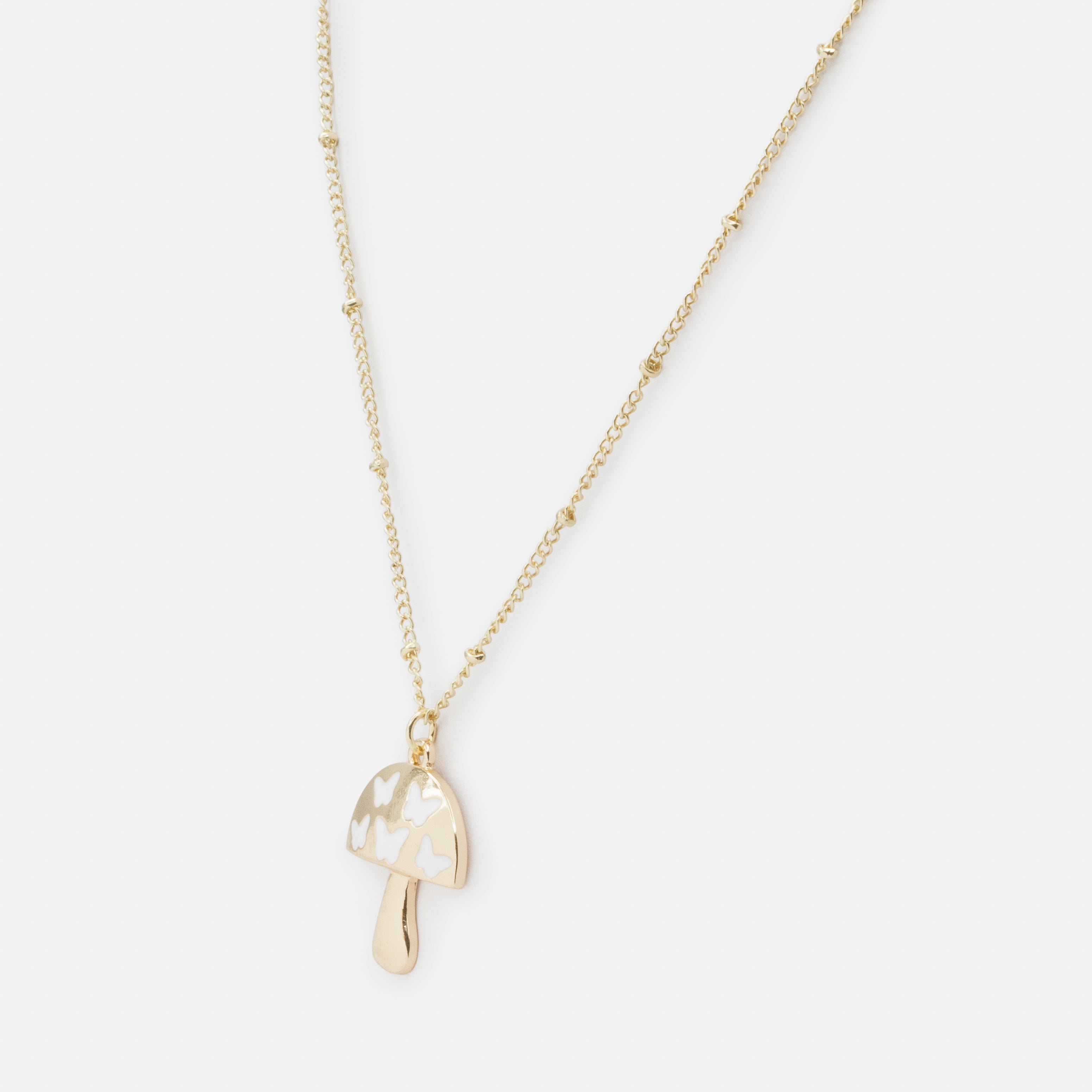Collier doré breloque champignon avec papillons blancs