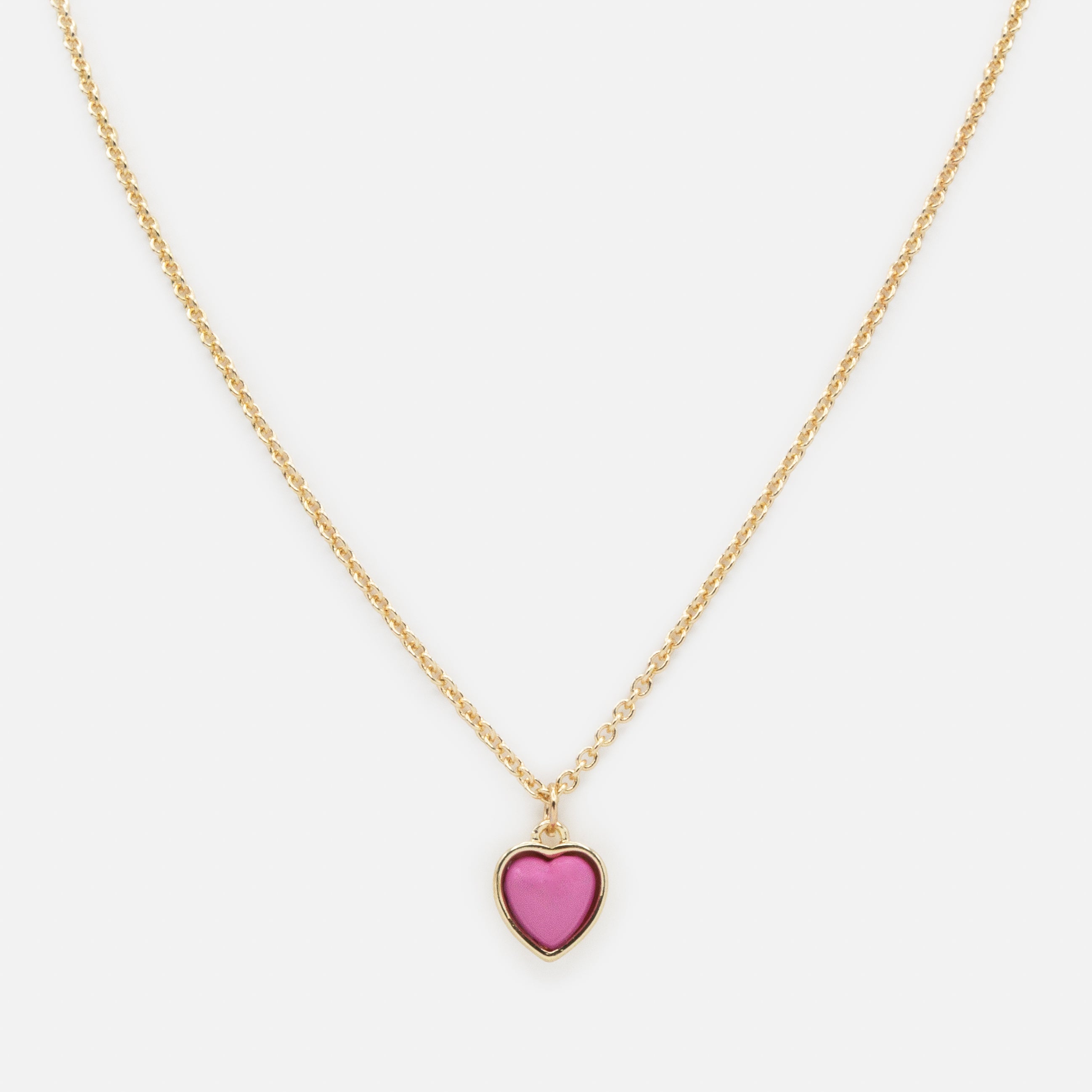 Collier doré breloque cœur rose
