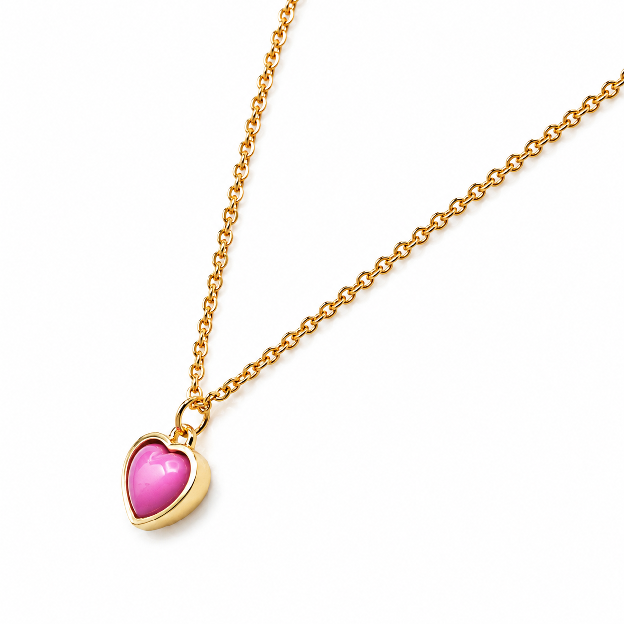 Collier doré breloque cœur rose