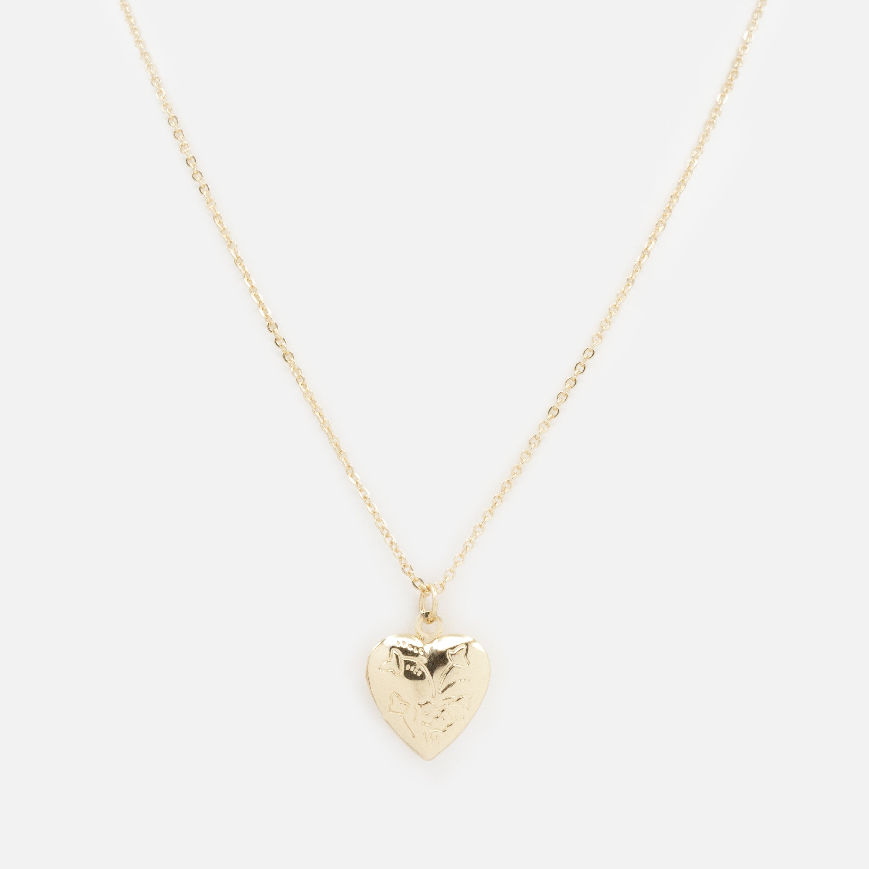 Collier doré médaillon cœur qui s'ouvre avec gravures