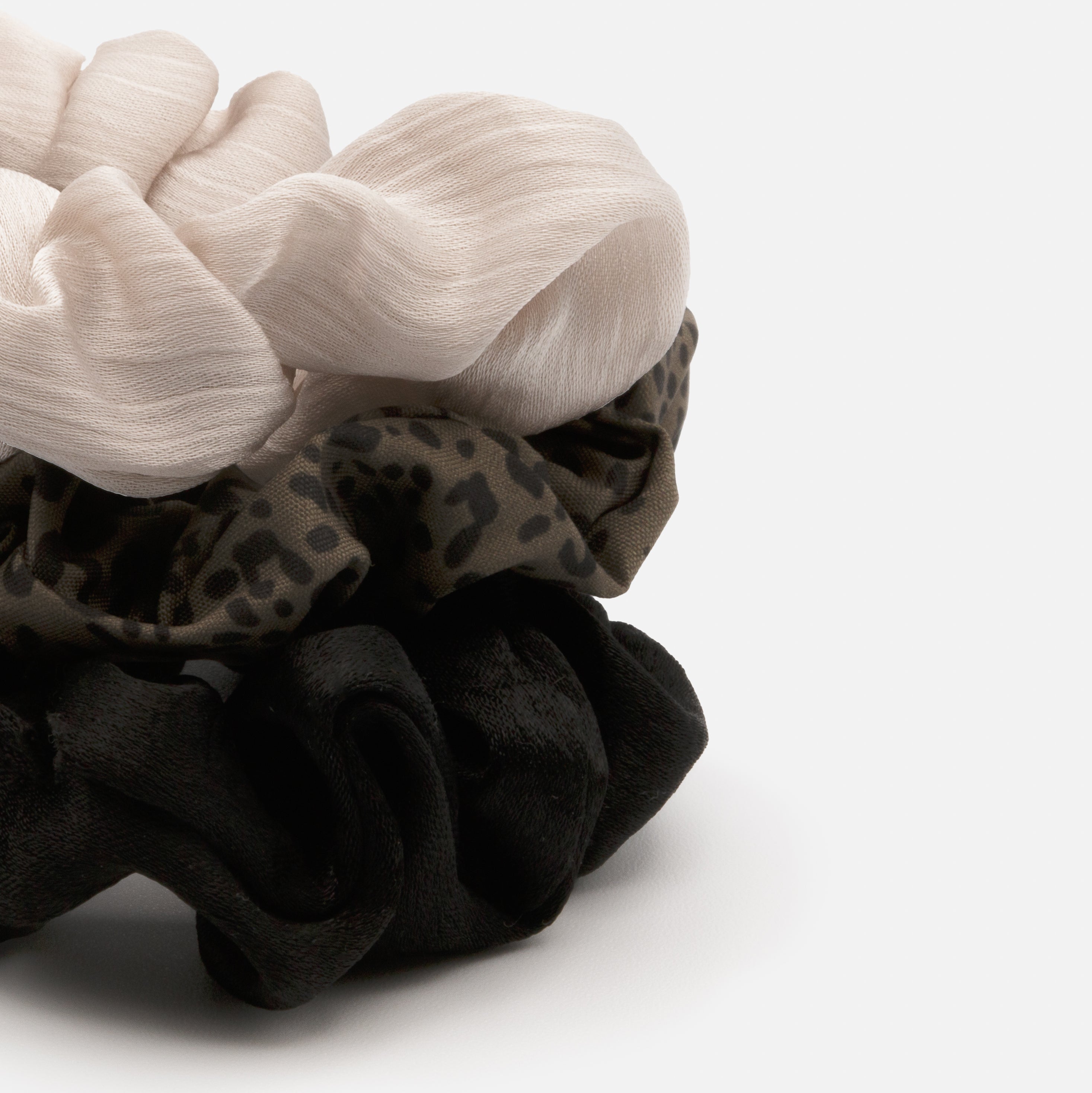 Trio of black, ivory and leopard scrunchies