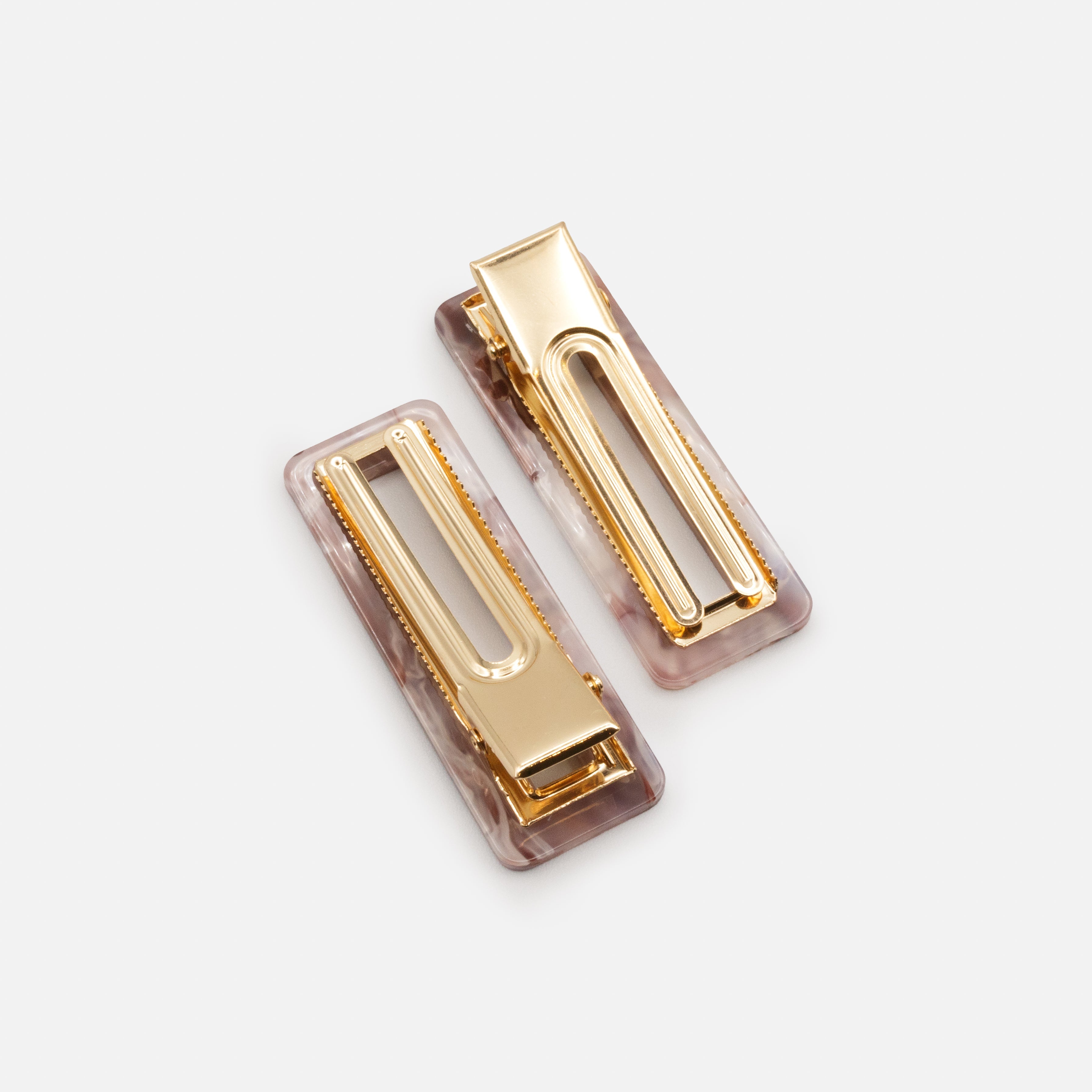 Duo of burgundy & lilac marbled plastic clips