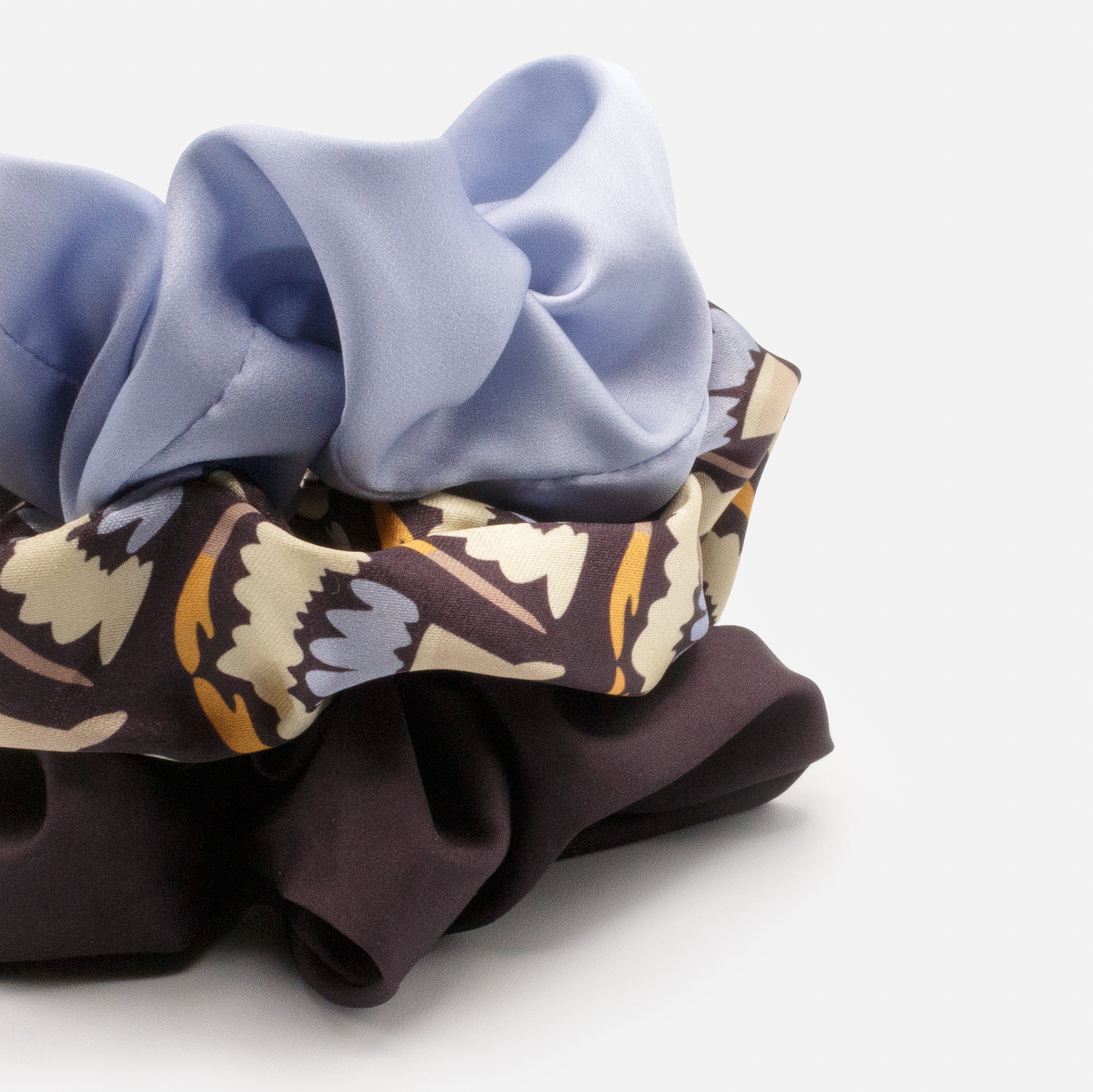 Trio of pale blue, dark mauve & patterned satin scrunchies