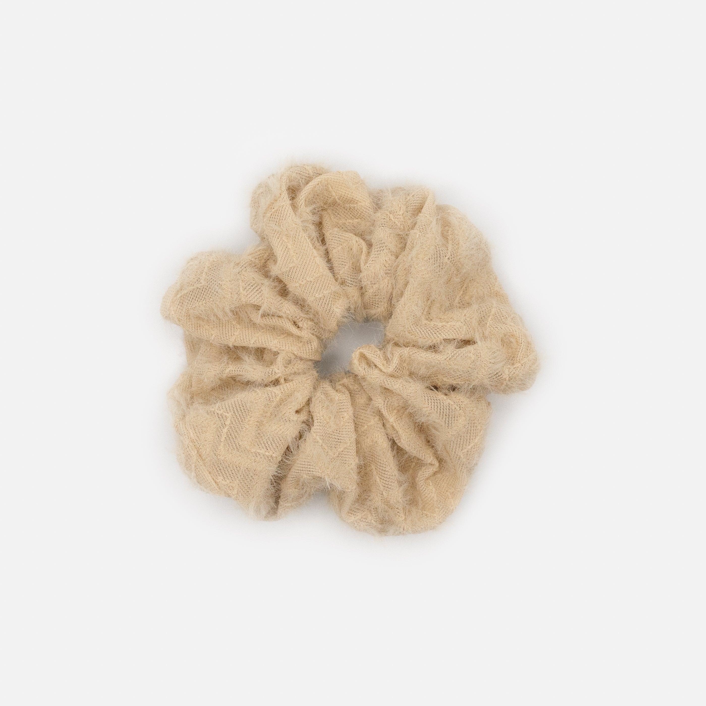 Beige scrunchie with embroidered pattern & woolly look