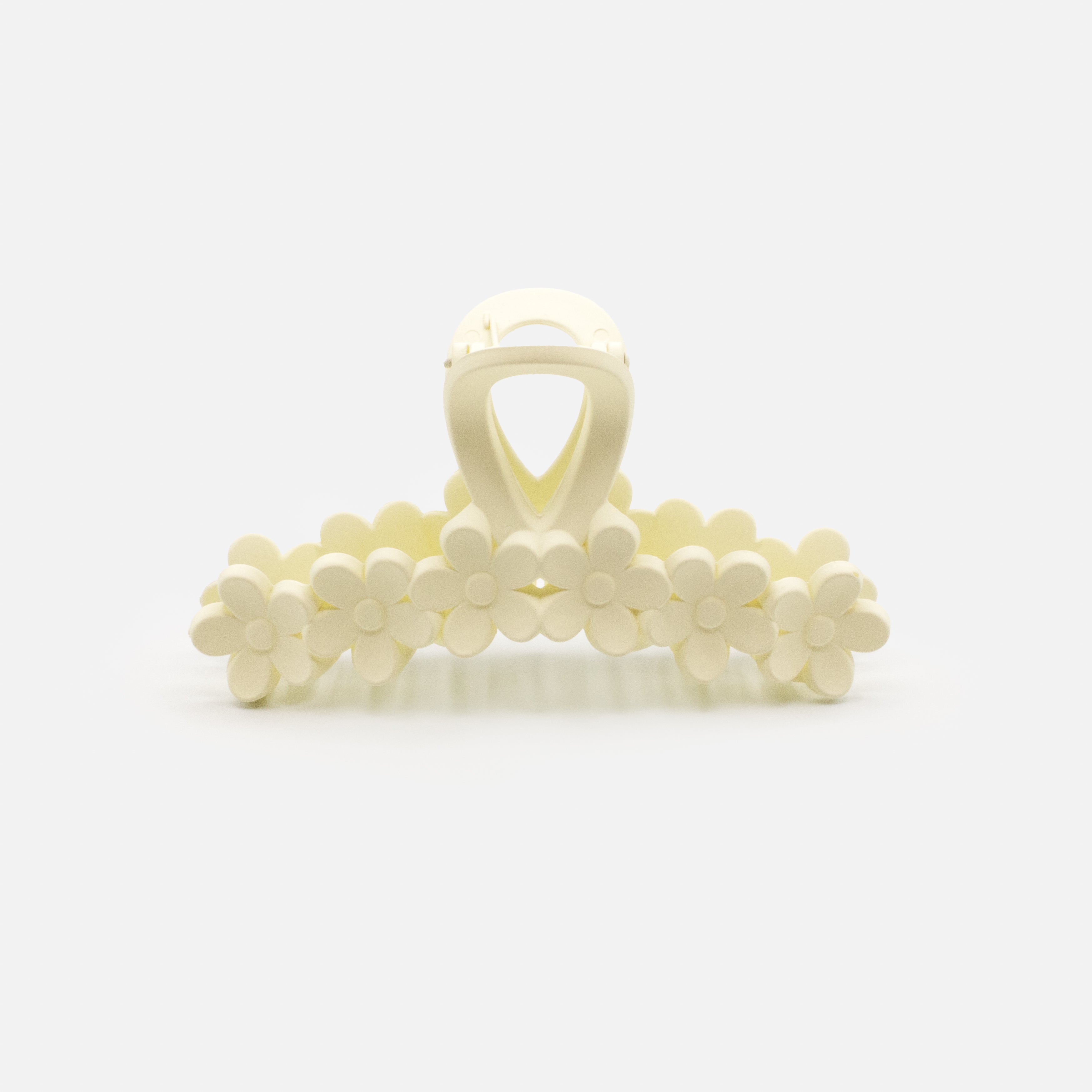 Ivory plastic flower clip with matte finish