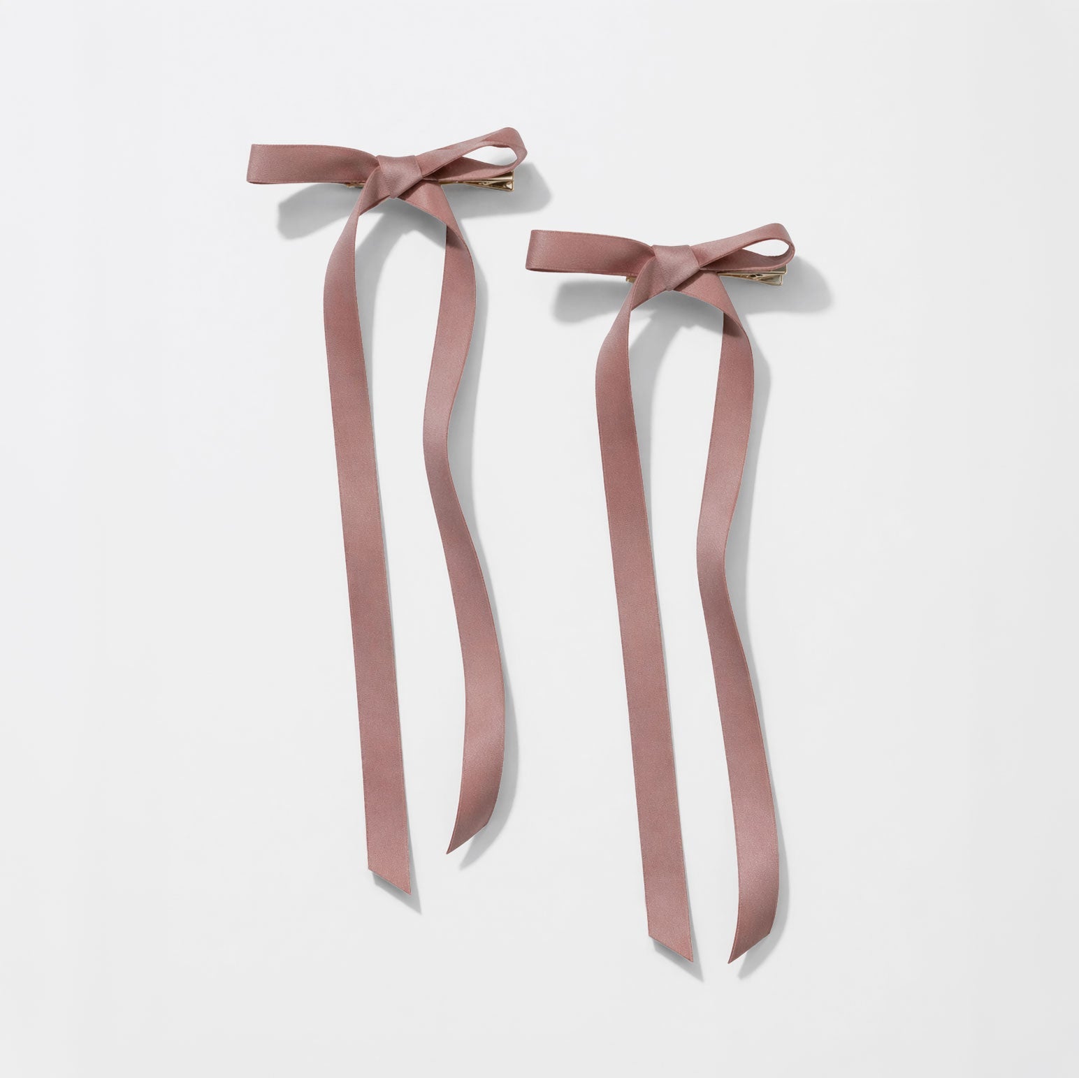 Duo de pinces à cheveux longues nœud rose poudré