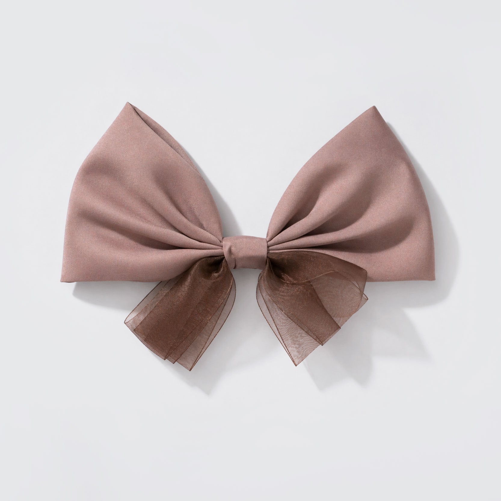 Pince à cheveux soyeuse nœud rose poudré et organza