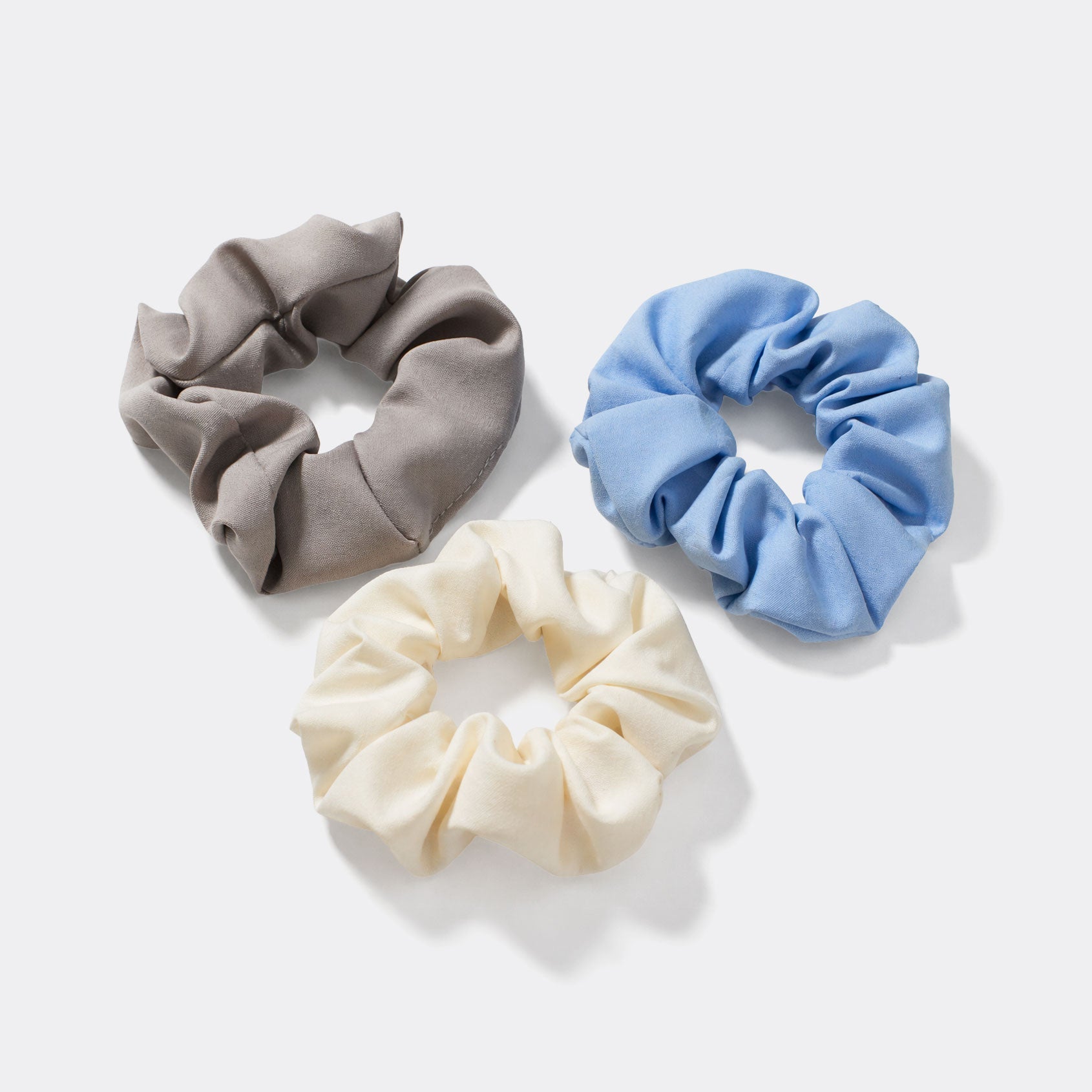 Trio de chouchous gris, bleu et ivoire