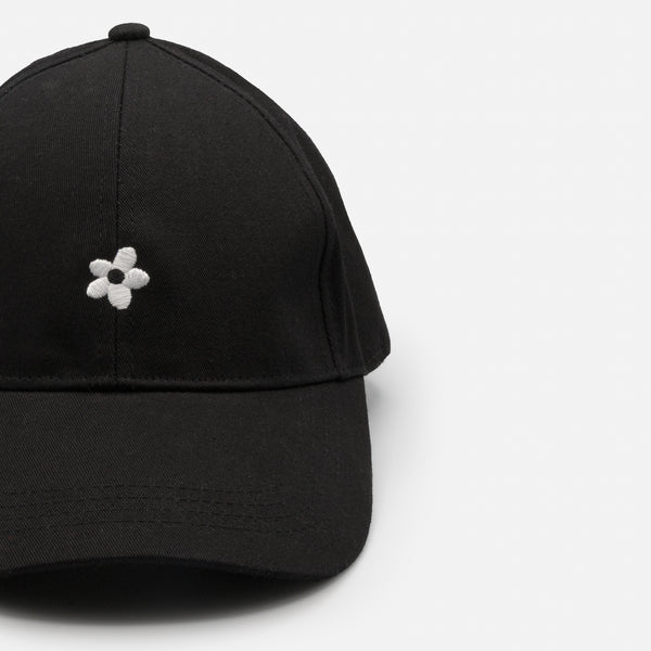 Load image into Gallery viewer, Black cap with white flower embroidery