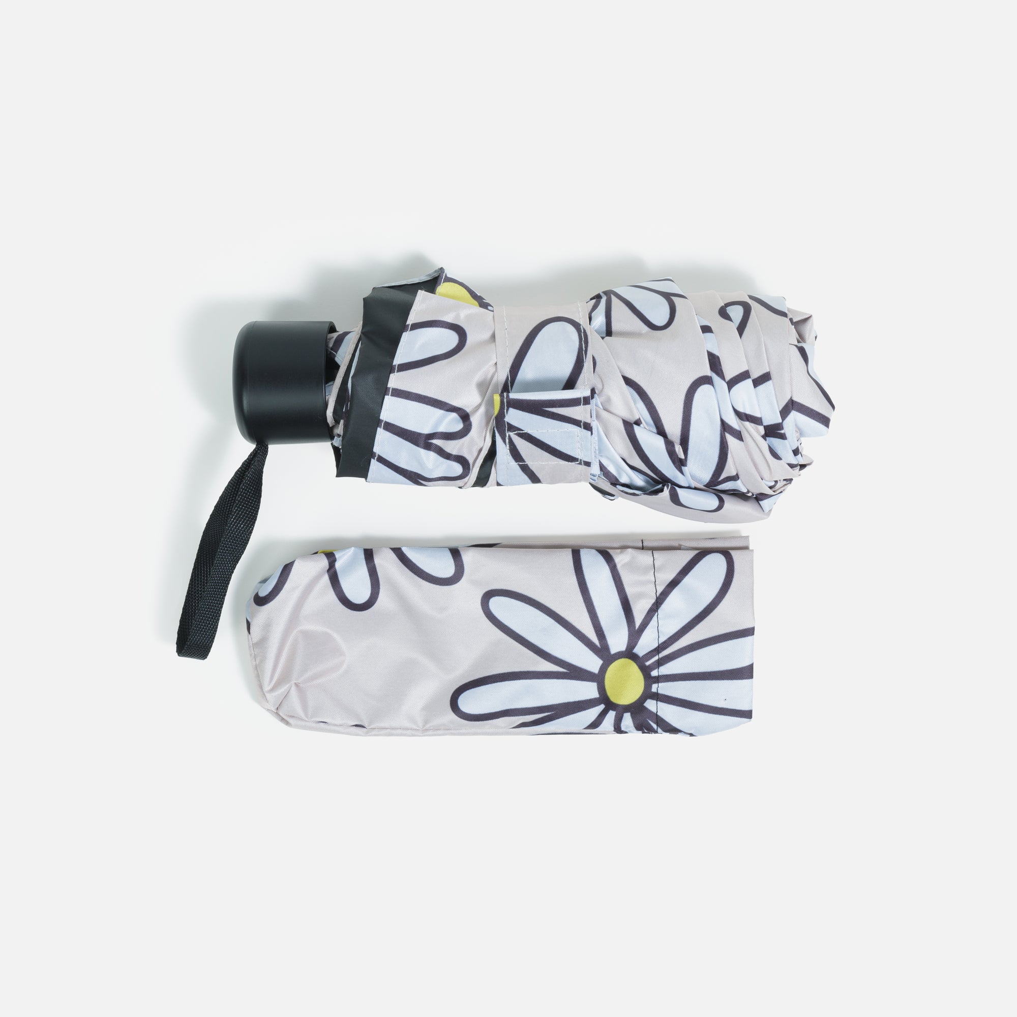 Beige umbrella with daisies and storage bag