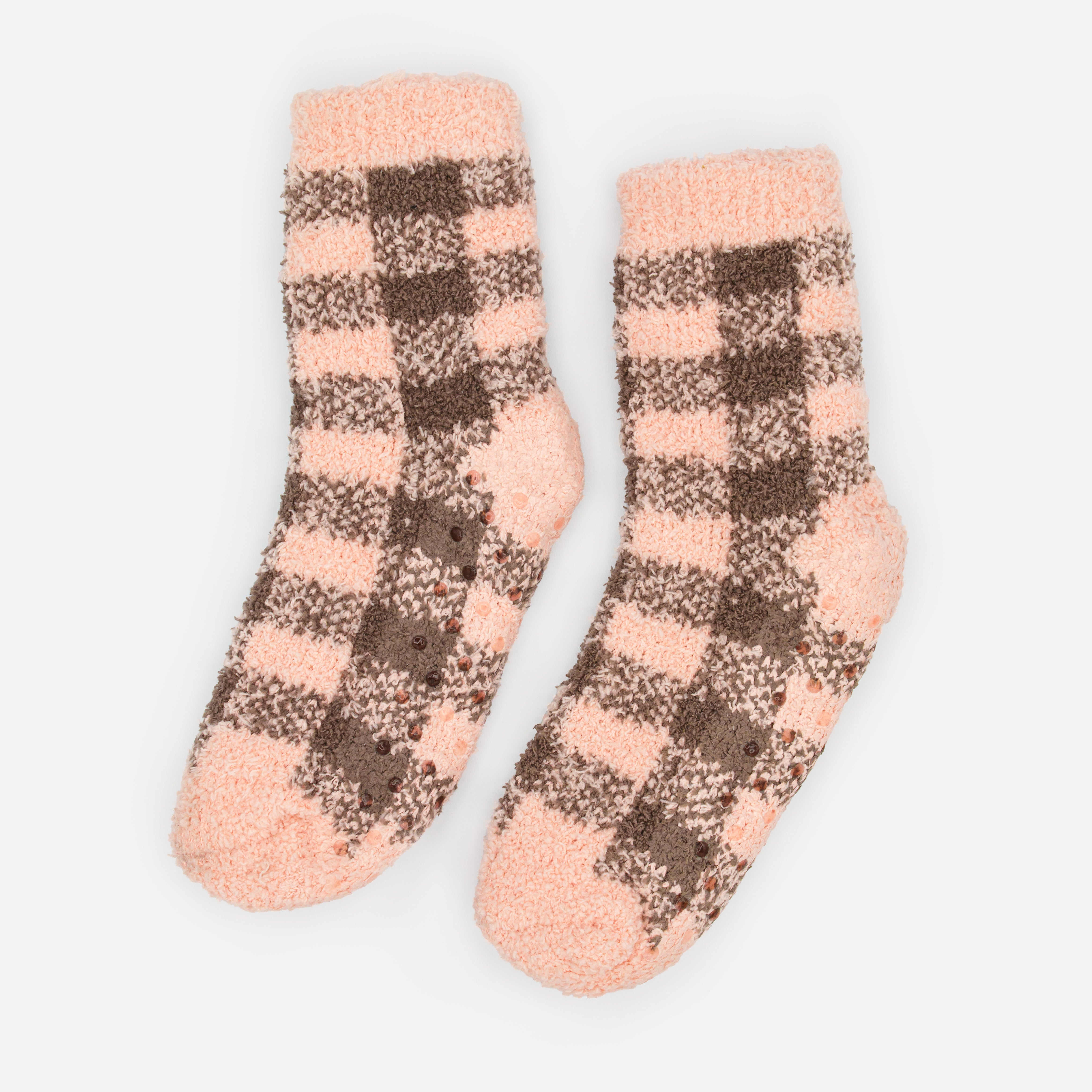 Pale pink cozy stockings with brown plaid