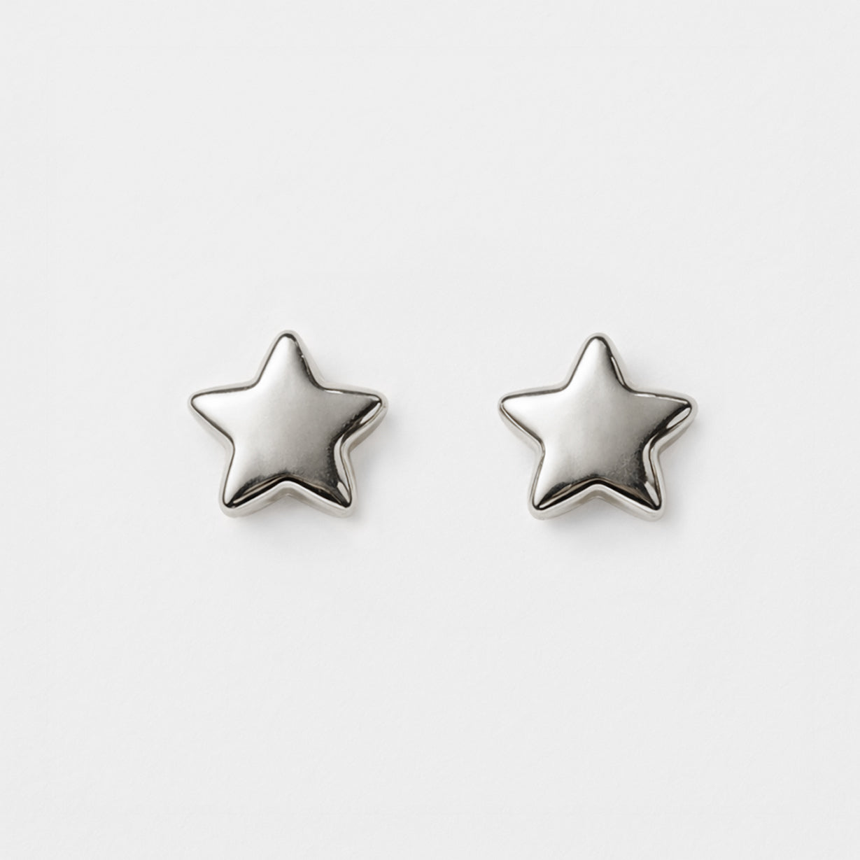 Mini boucles d'oreilles étoiles argentées en acier inoxydable