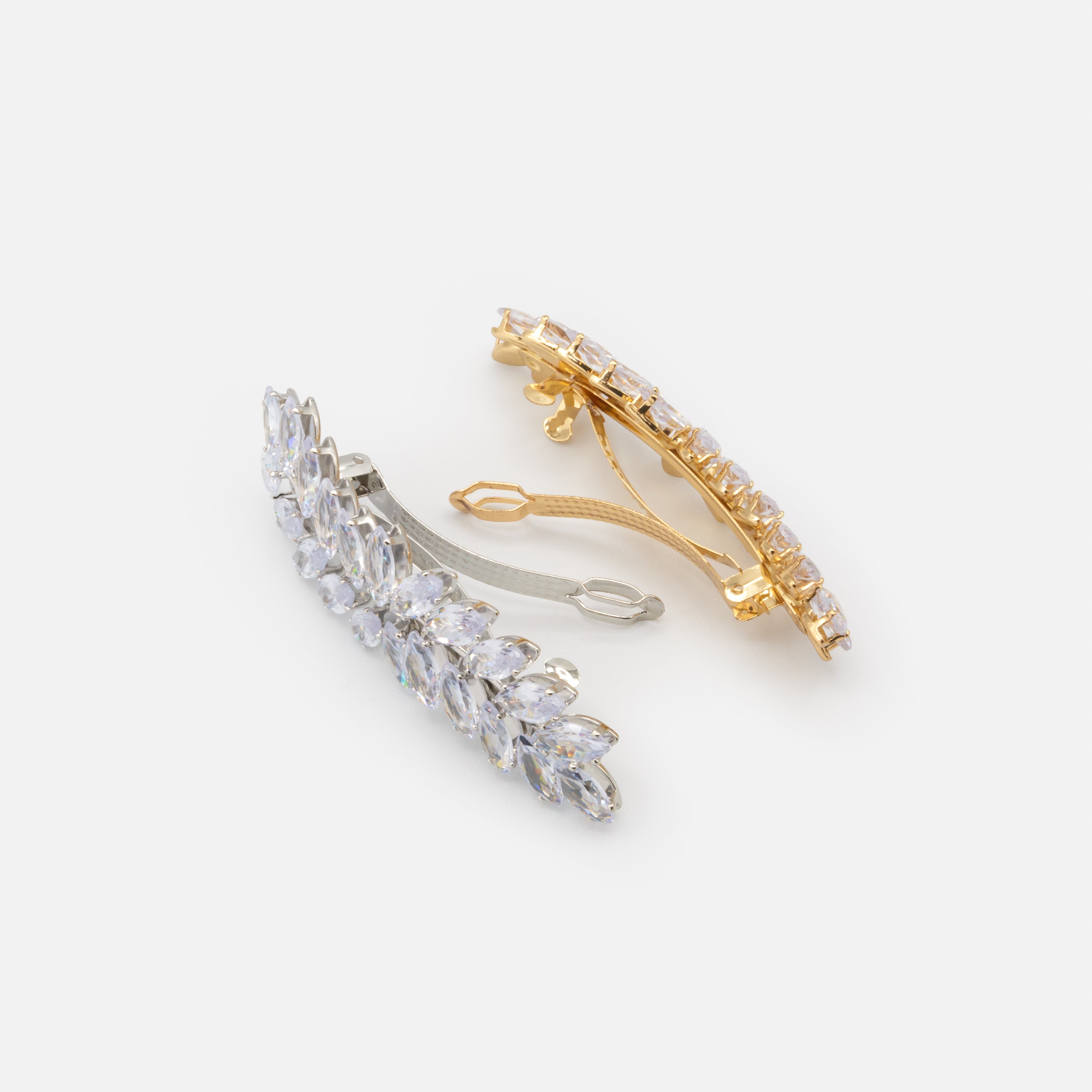 Duo of gold and silver leaf clips