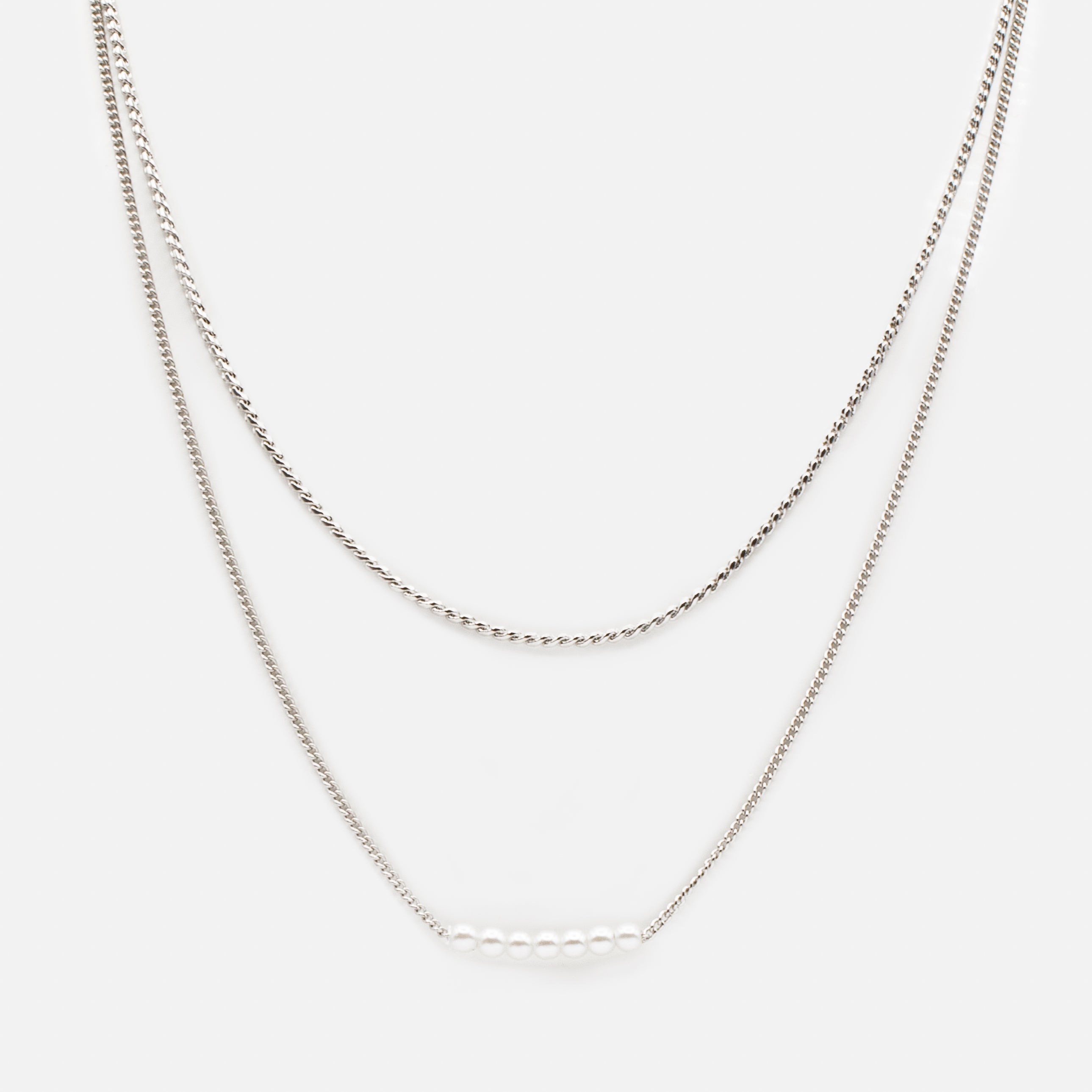 Set of two silver necklaces with "s" links and round synthetic pearls