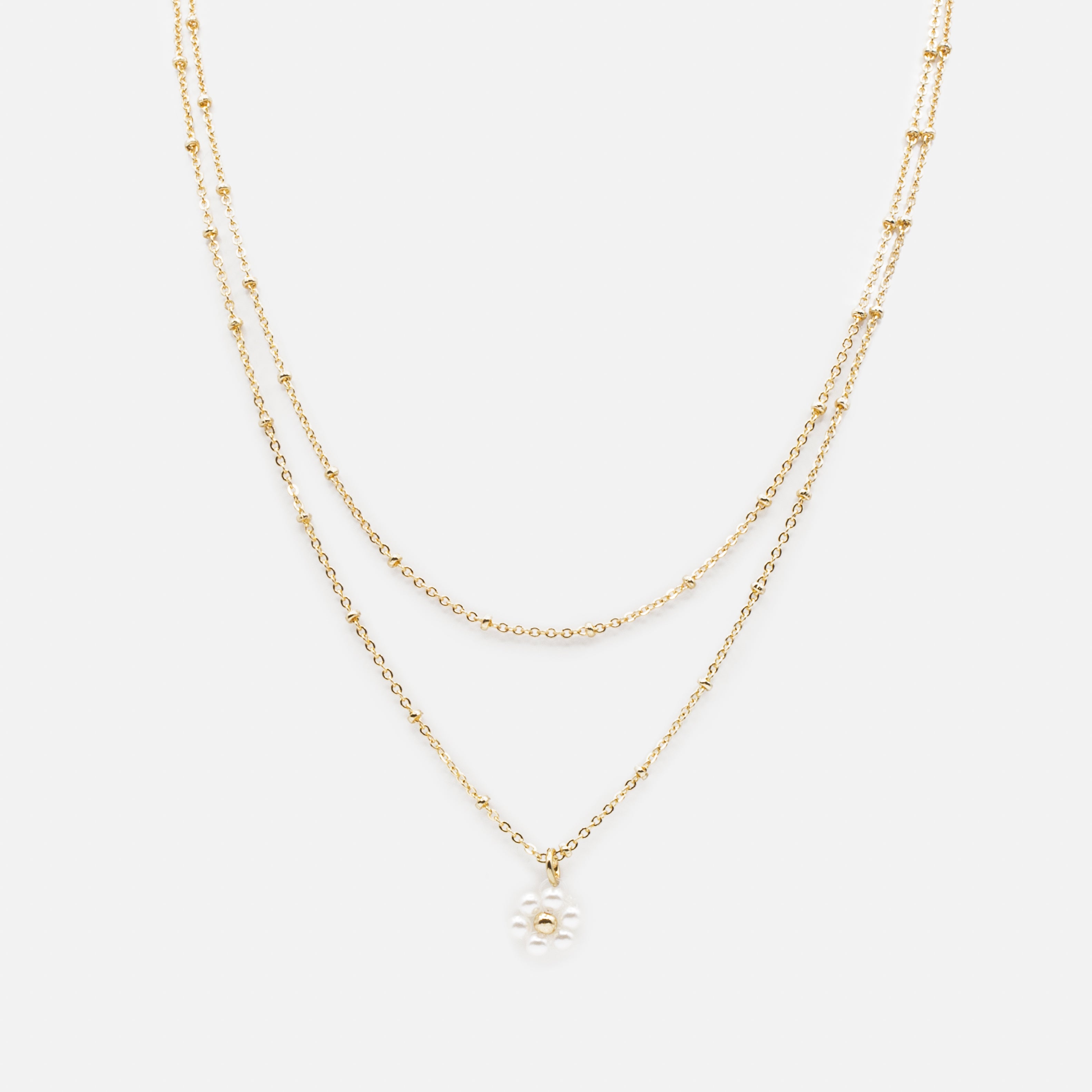 Ensemble de deux colliers dorés pendentif fleur en perles