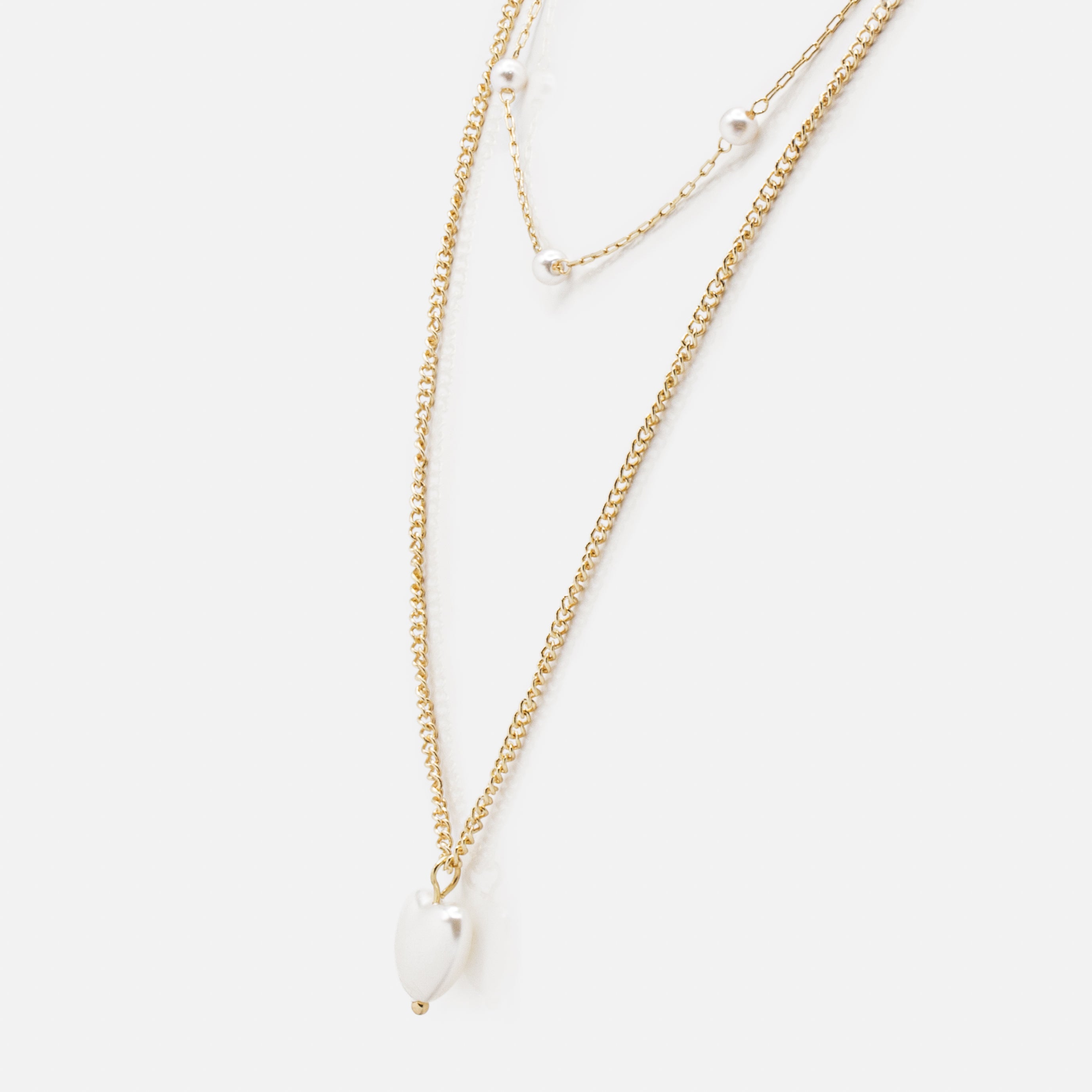 Collier doré double chaîne pendentif perle en coeur