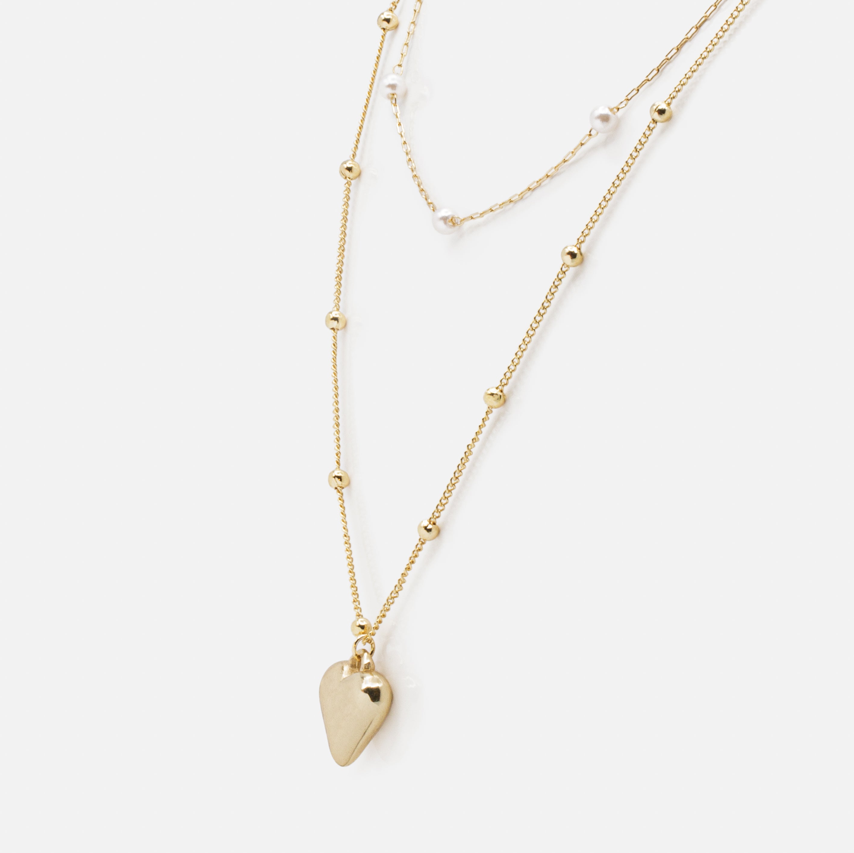 Collier double chaîne pendentif coeur doré
