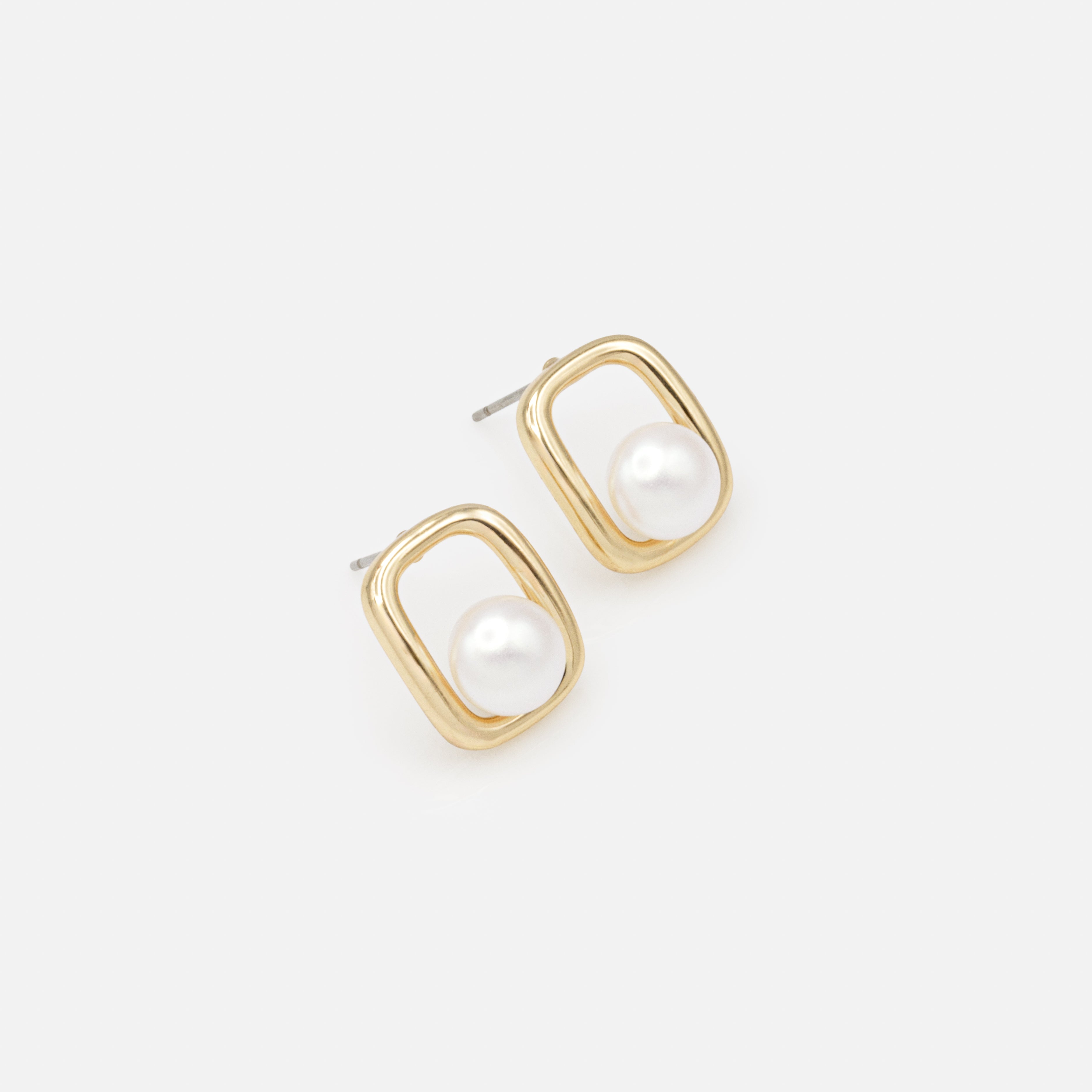 Boucles d'oreilles perle dans son cadre doré