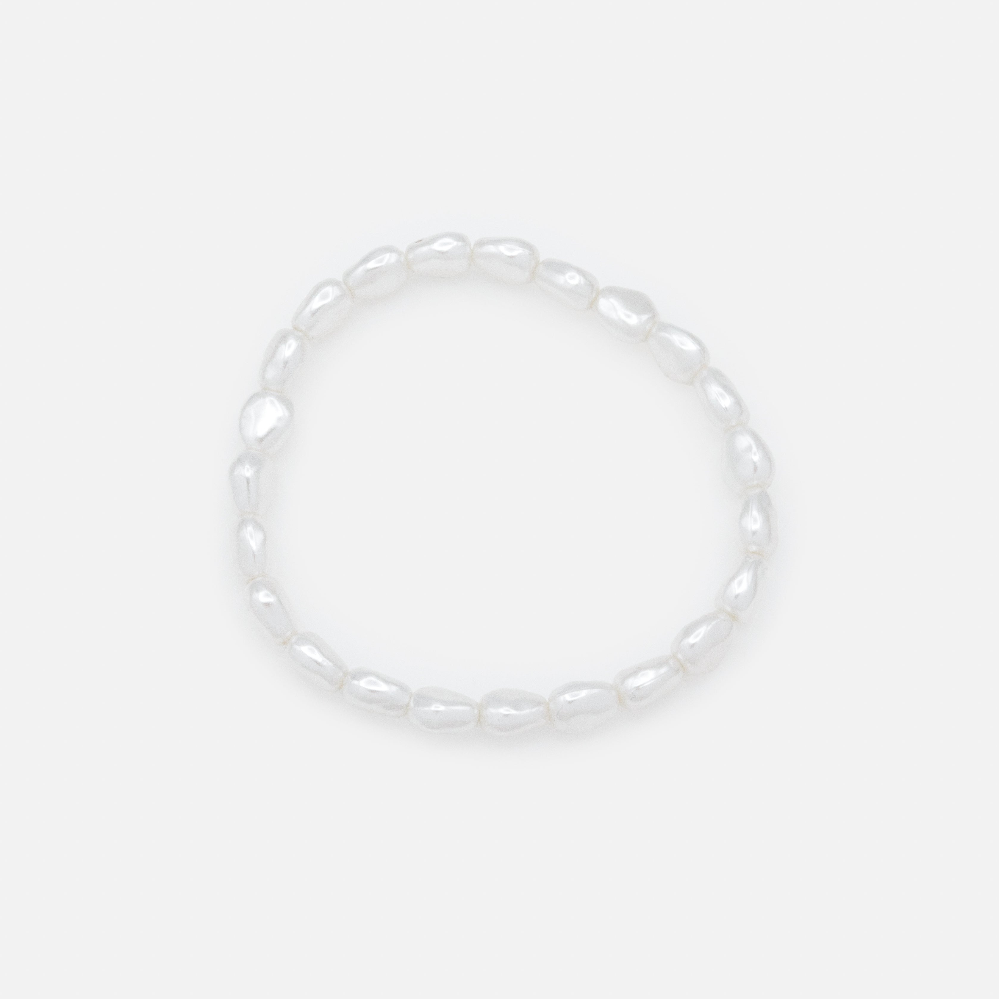 Trio of gold trombone mesh bracelets and pearls