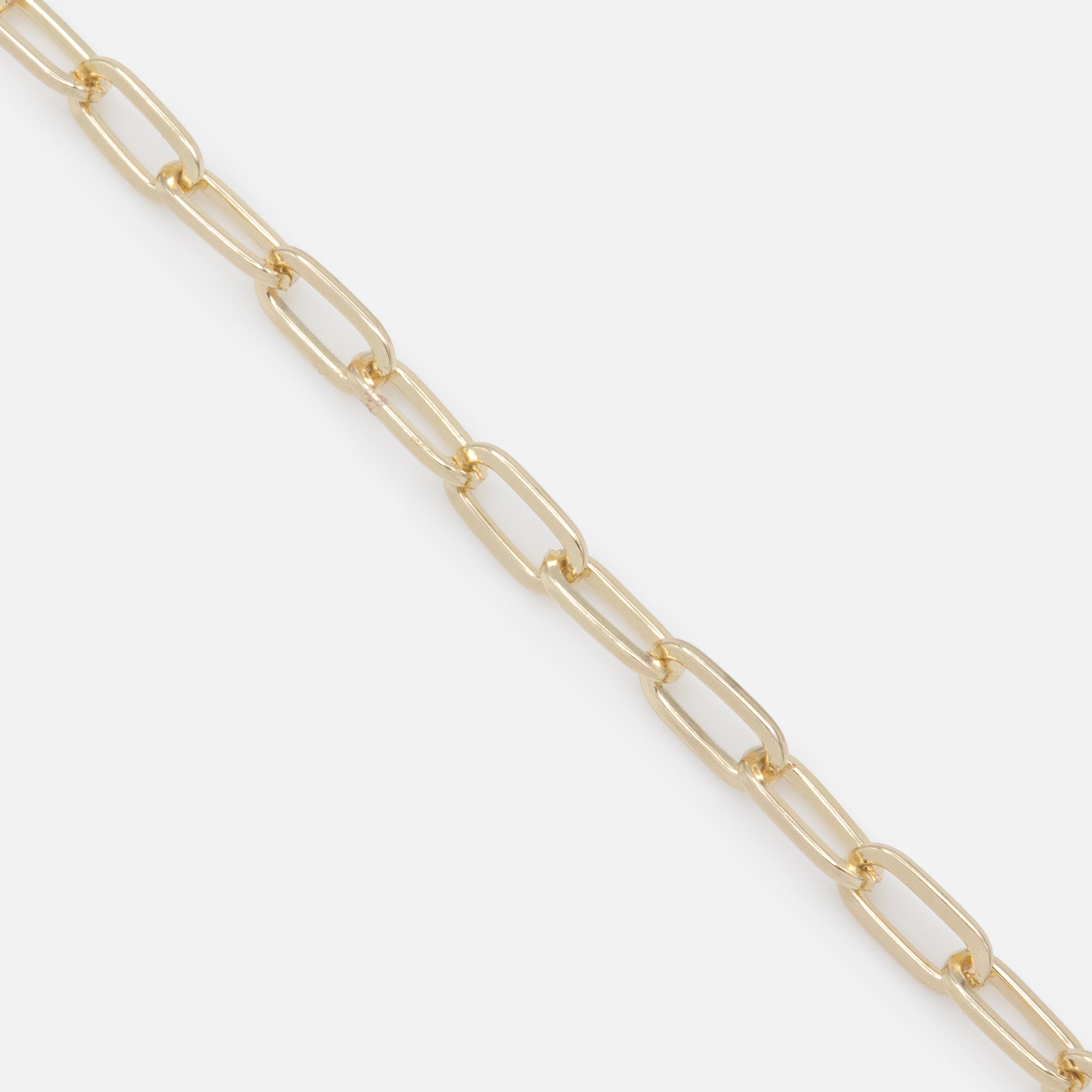 Trio of gold trombone mesh bracelets and pearls