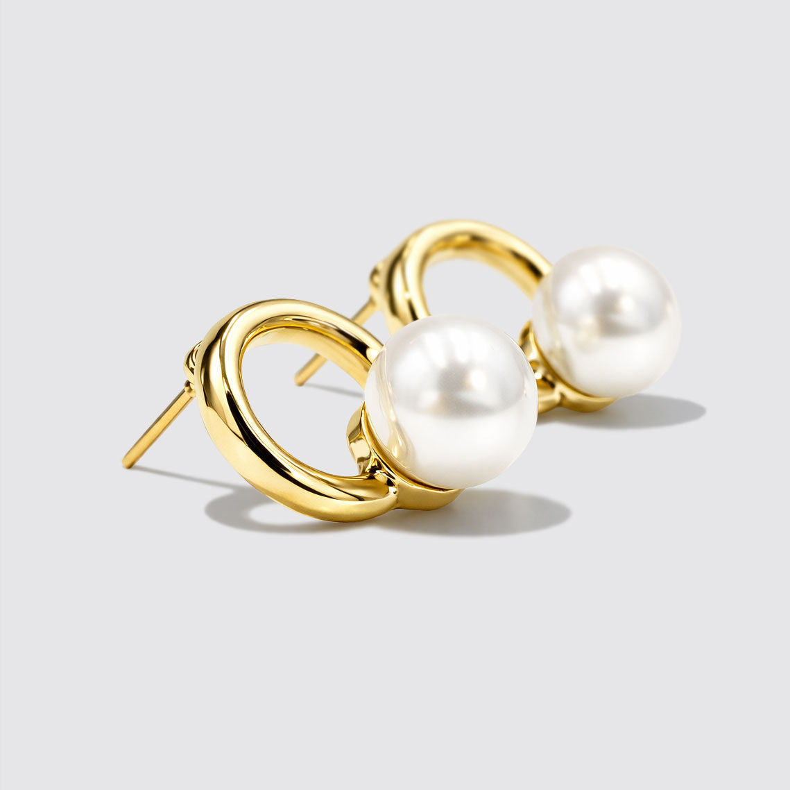Boucles d'oreilles anneaux doré avec perle