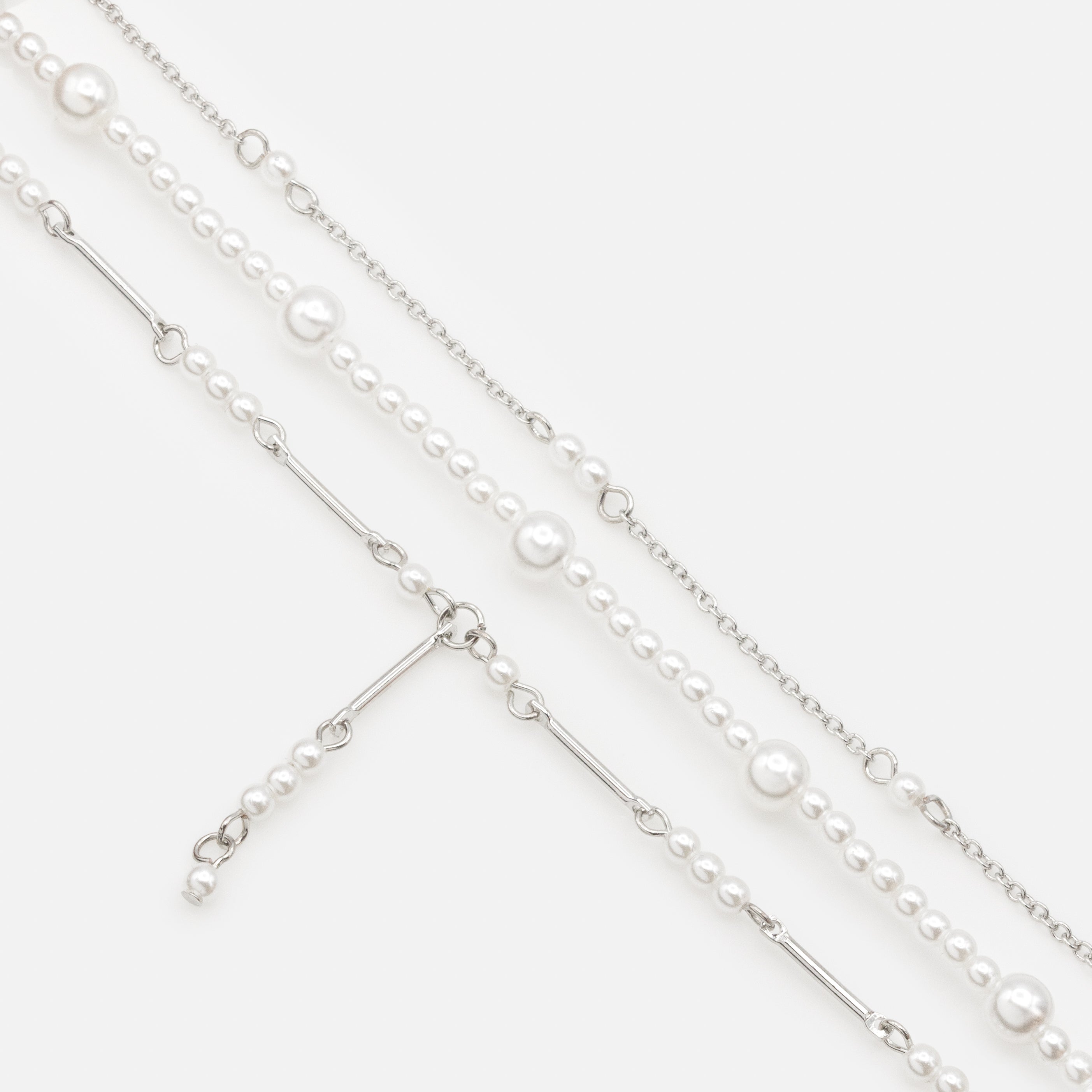 Trio of silver bracelets with pearls