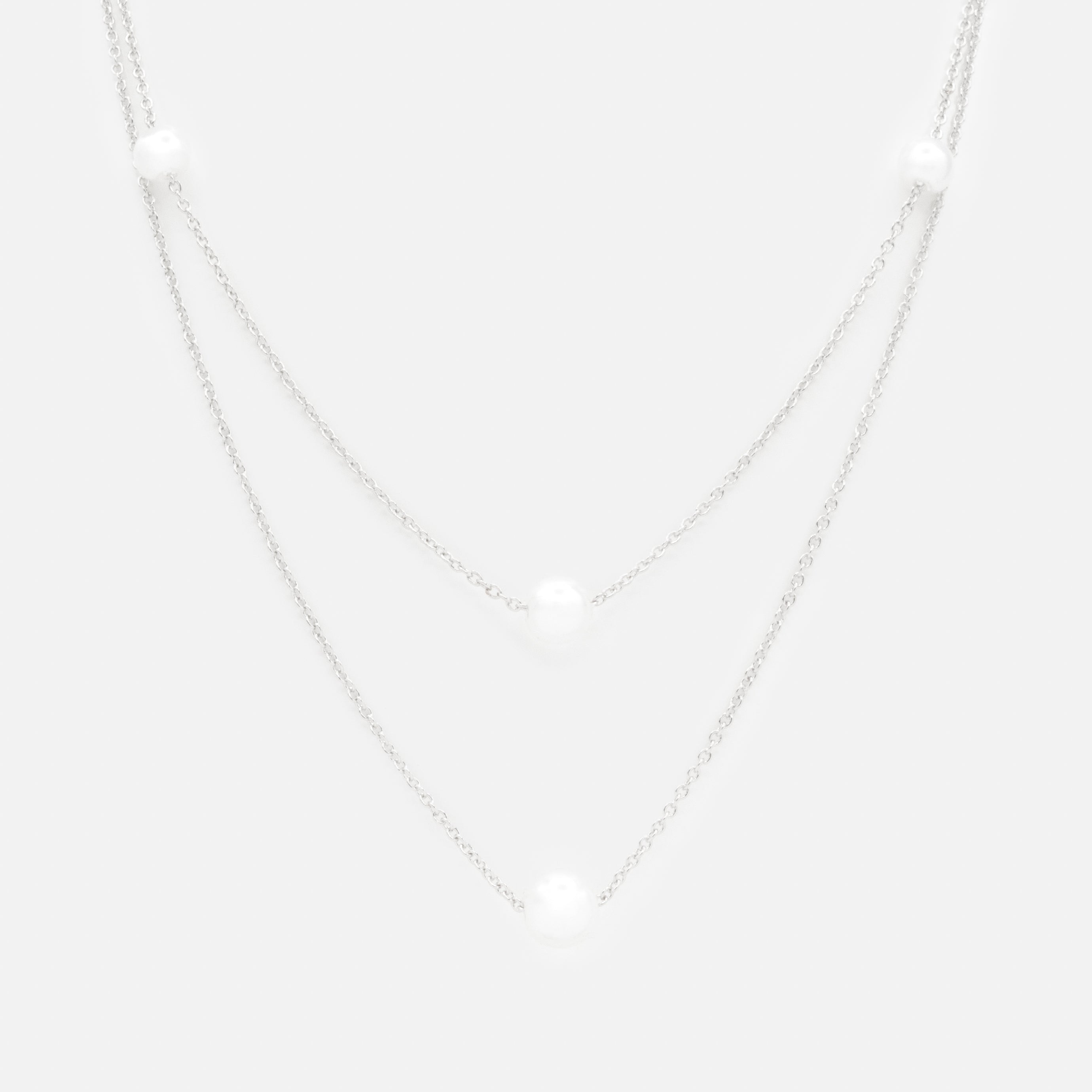 Collier argenté double chaîne avec perles rondes