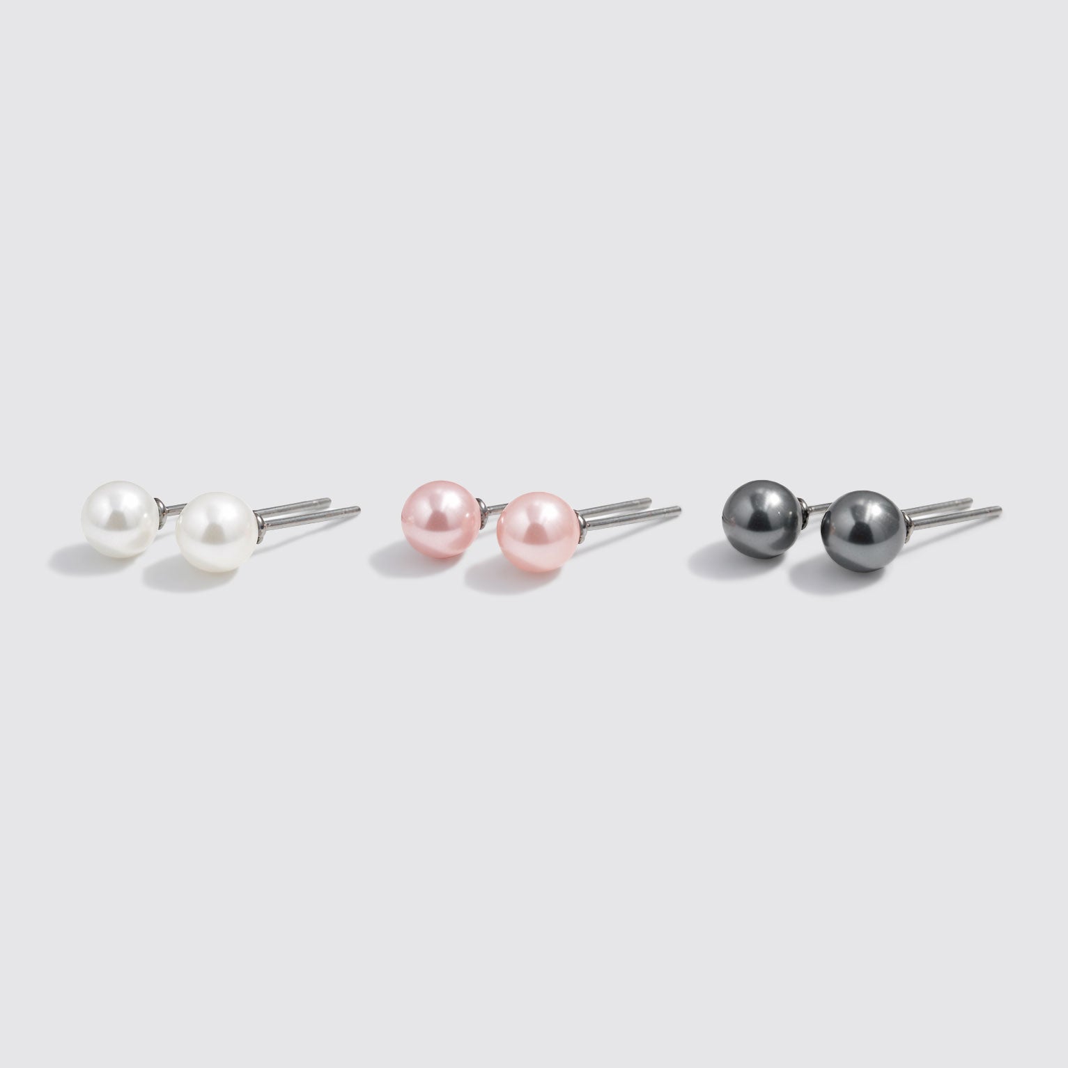 Trio de clous d'oreilles perles blanches, roses et noires