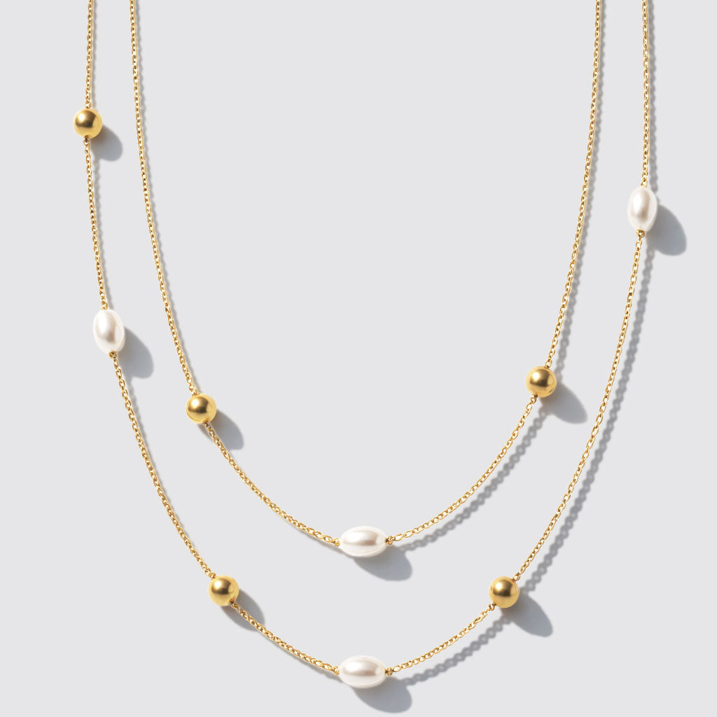 Collier double rang doré à perles et billes