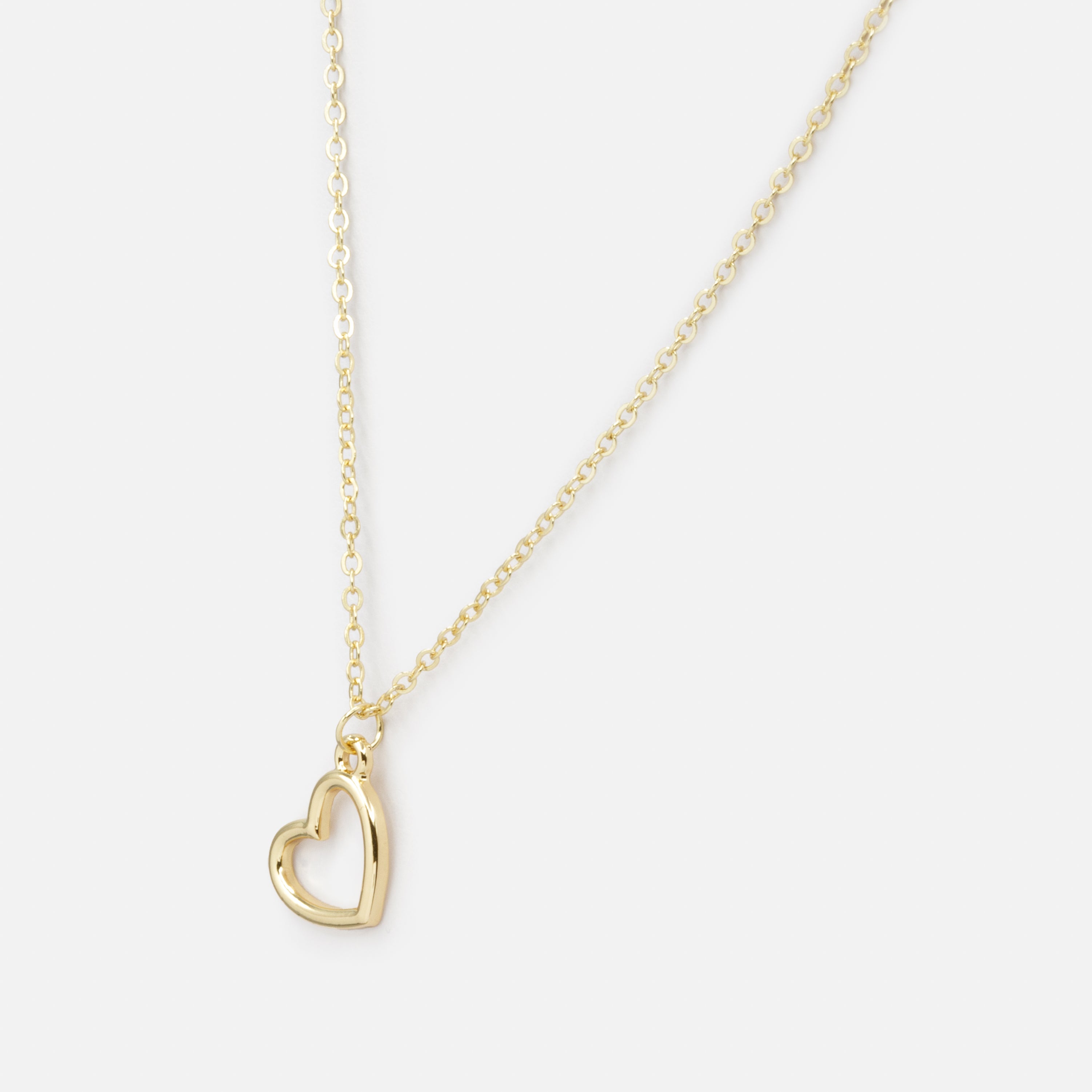 Collier doré avec breloque grand coeur