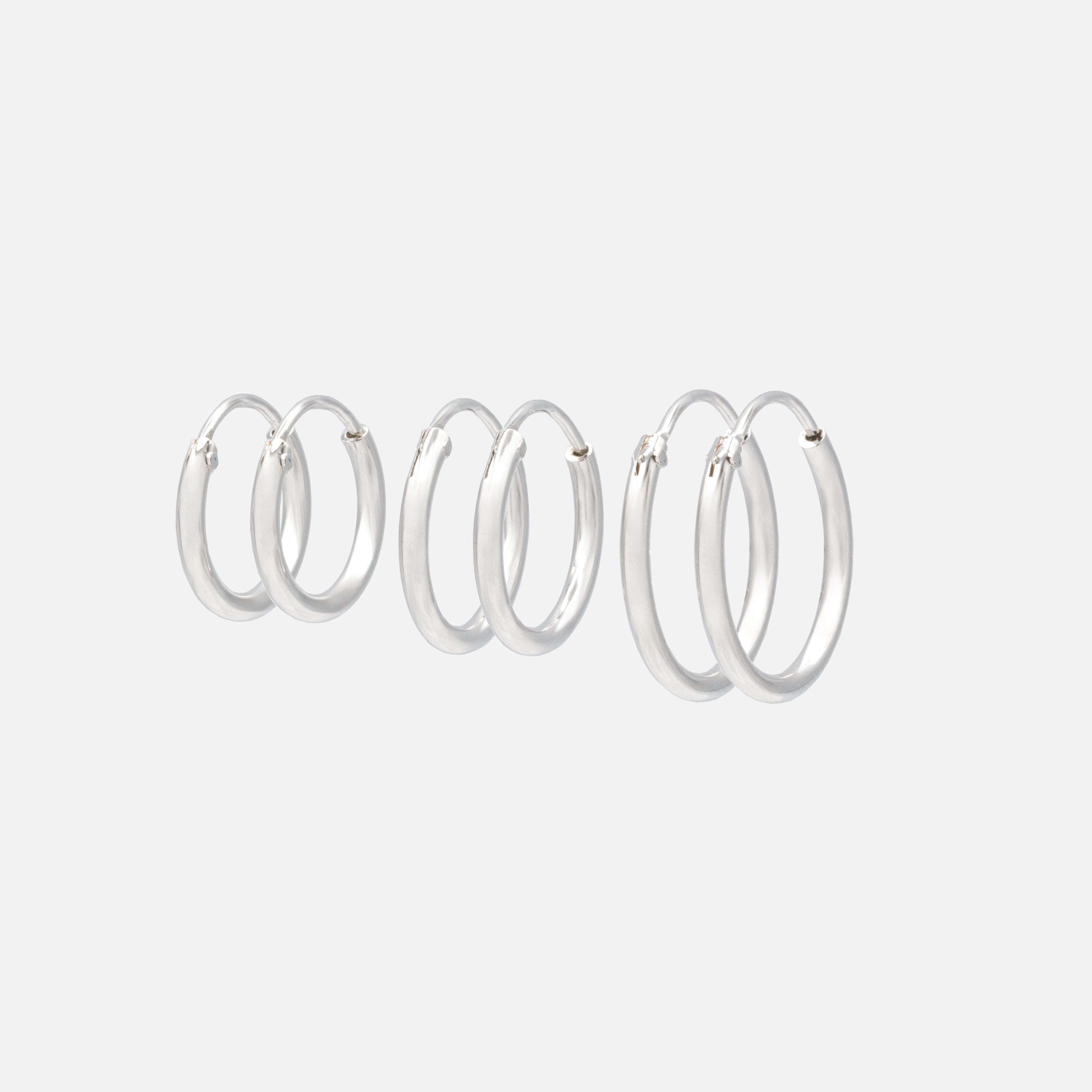 Trio de boucles d'oreilles dormeuses argentées
