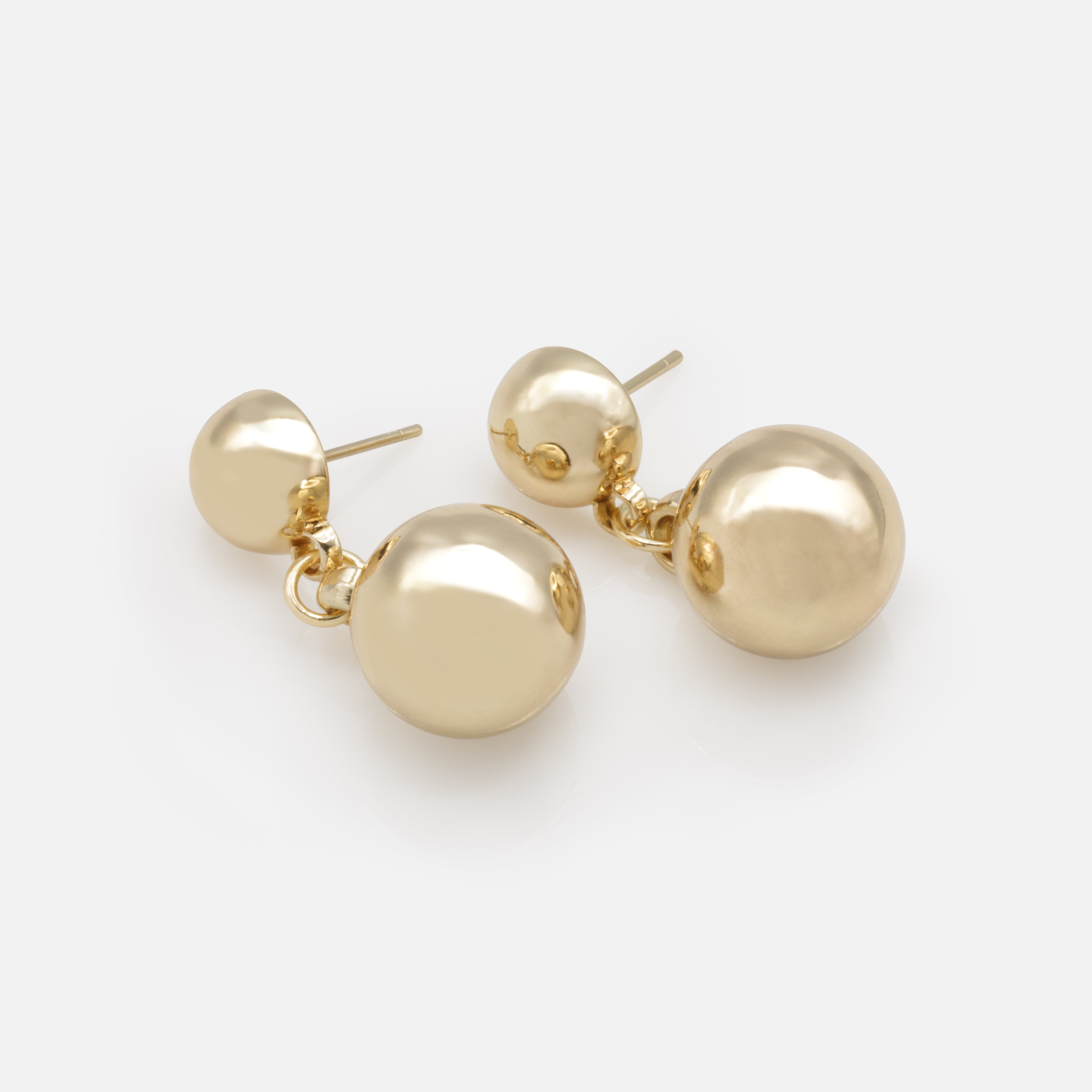 Gold dangling sphere earrings