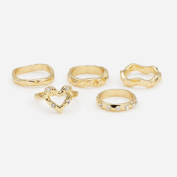 Load image into Gallery viewer, Set of five hammered gold rings in various sizes with cubic zirconia stones
