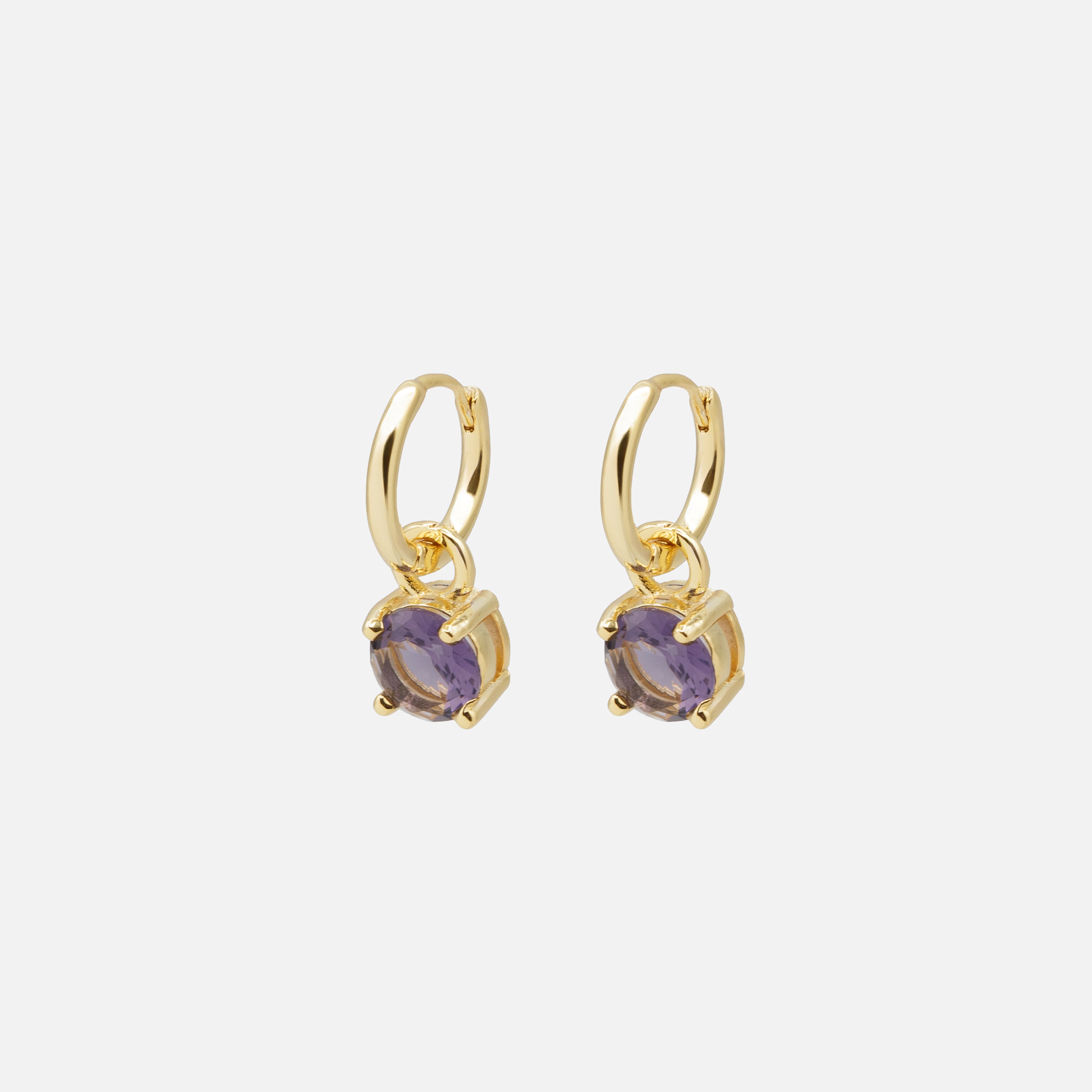 Gold huggie earrings with purple stone charm