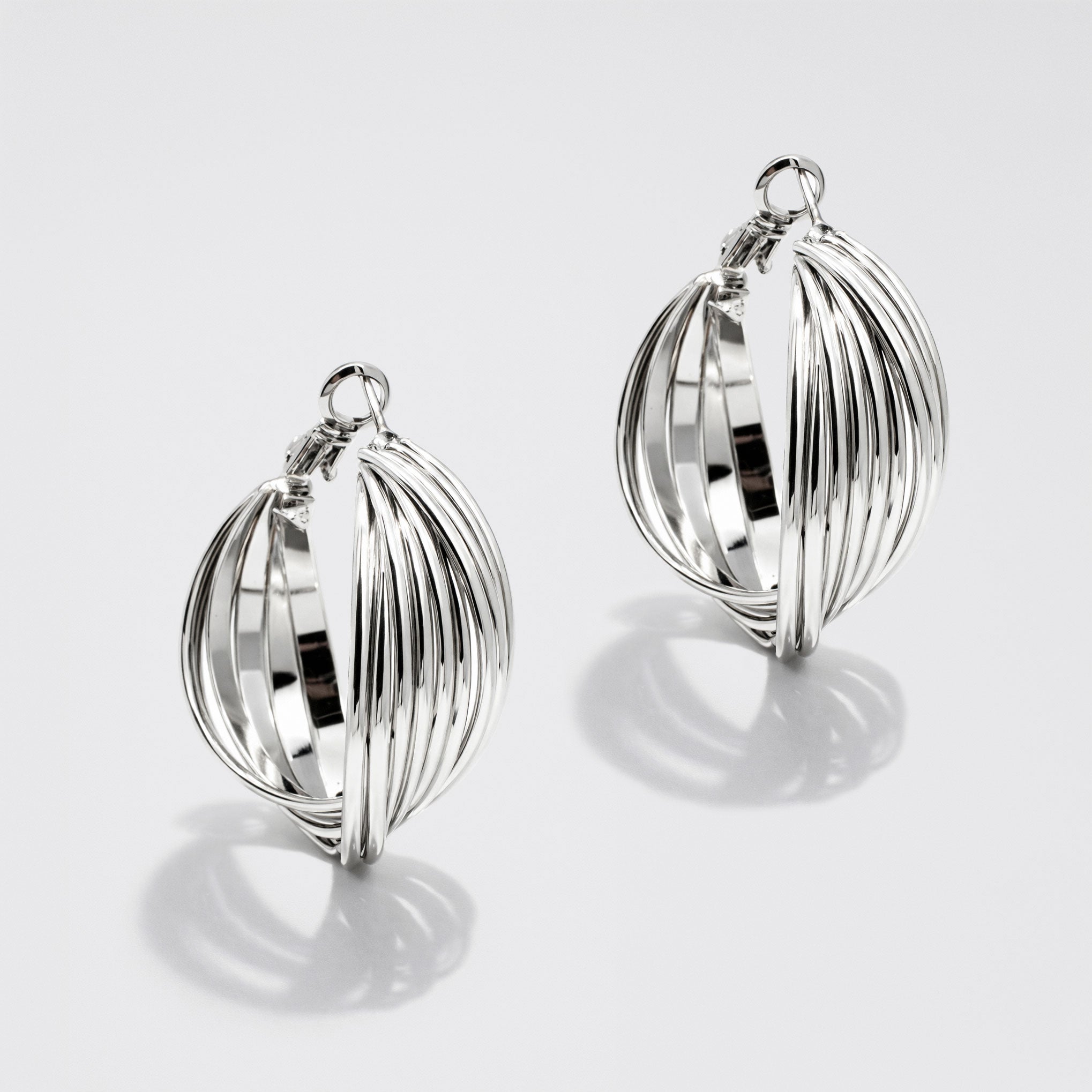 Boucles d'oreilles torsadées argentées