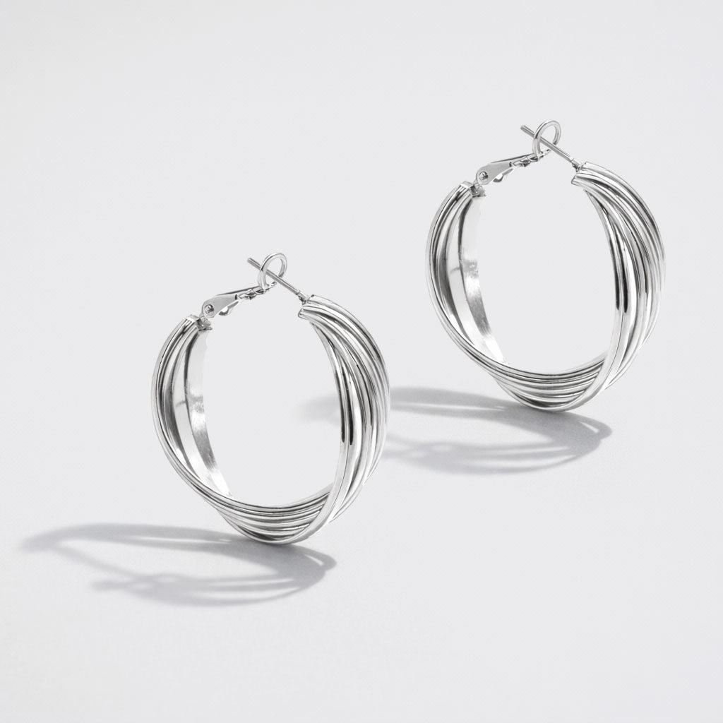 Boucles d'oreilles torsadées argentées