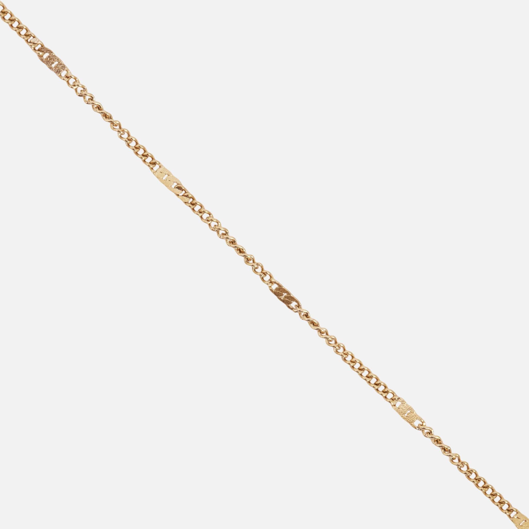 Gold bracelet with flat stainless steel inserts