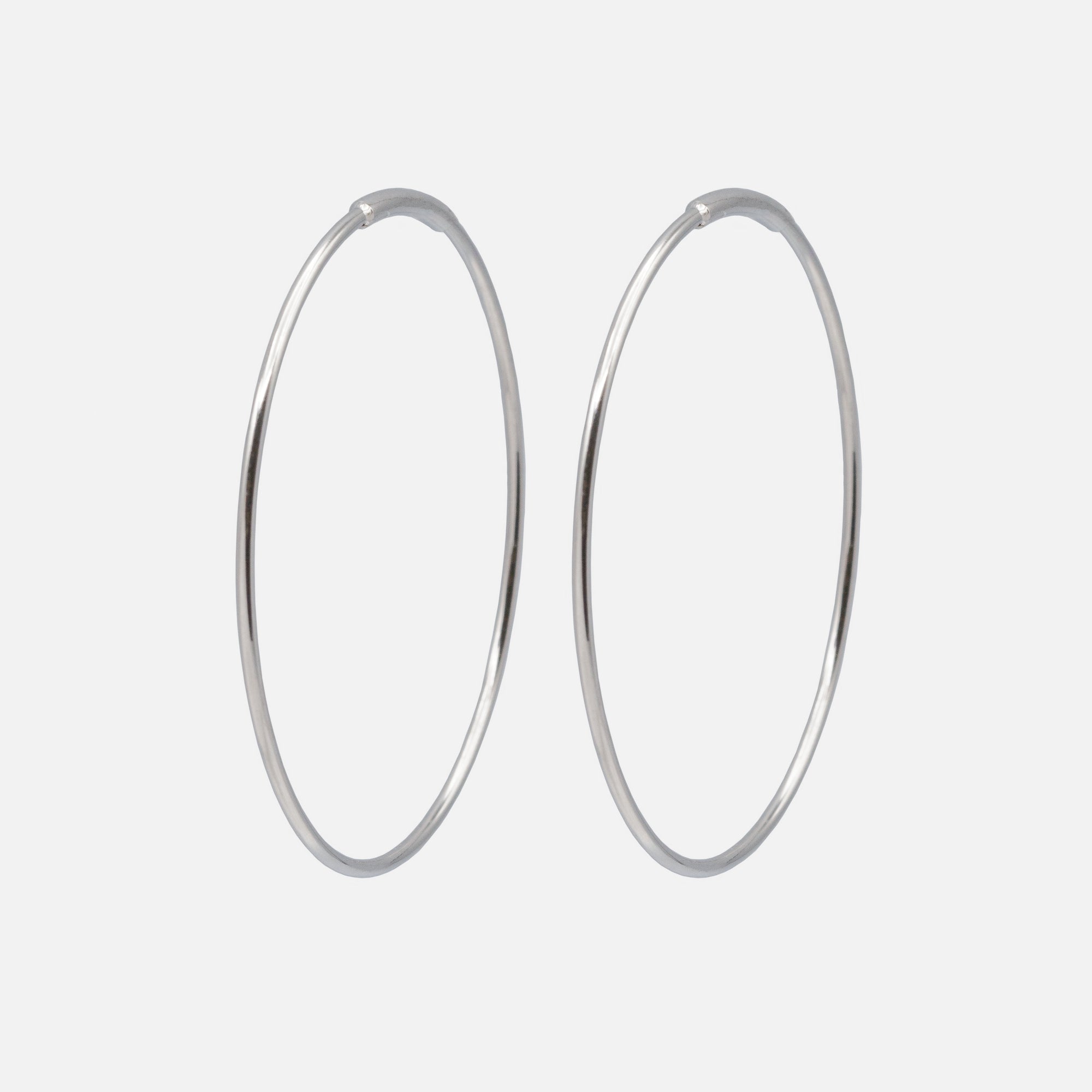 Thin silver-plated stainless steel hoop earrings