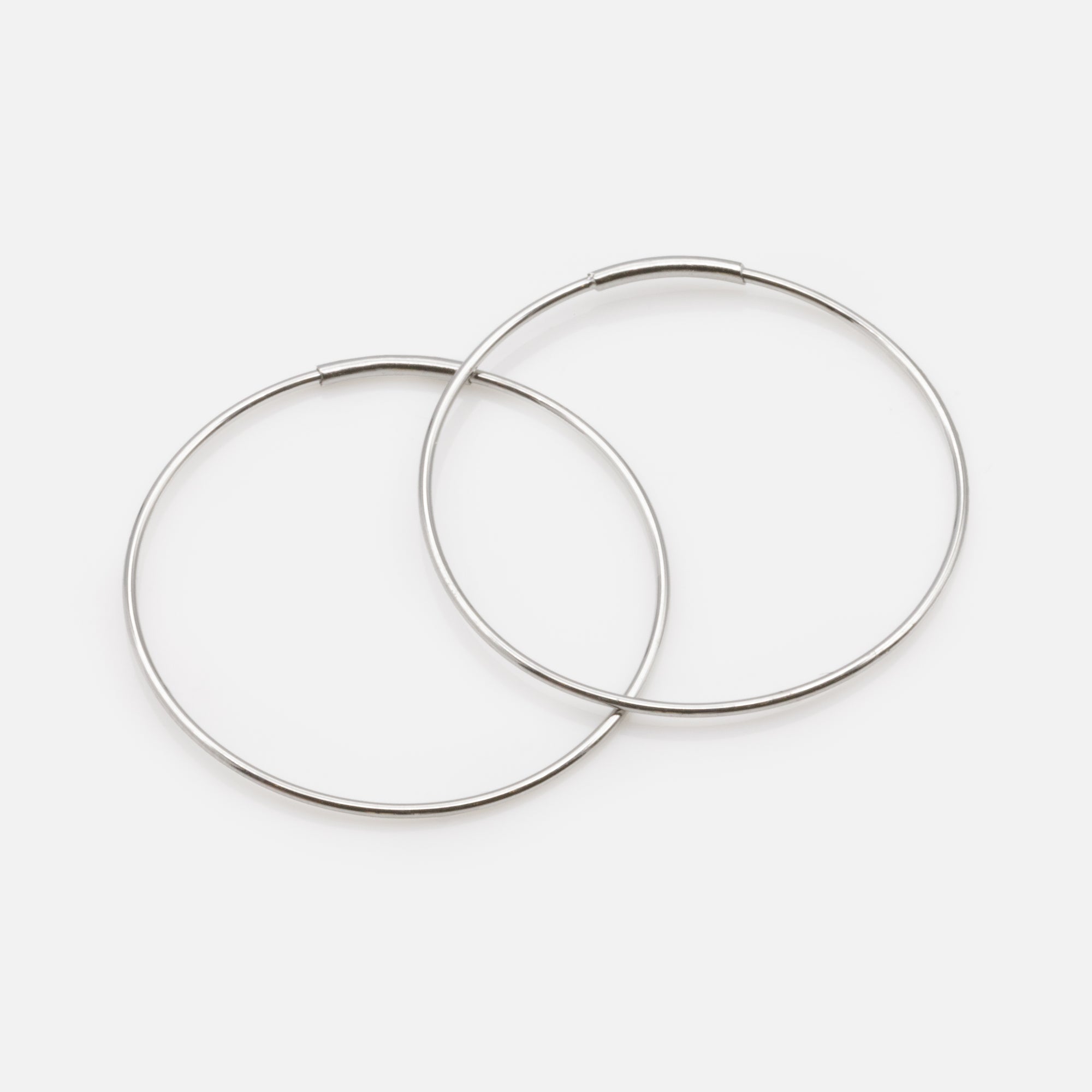 Thin silver-plated stainless steel hoop earrings