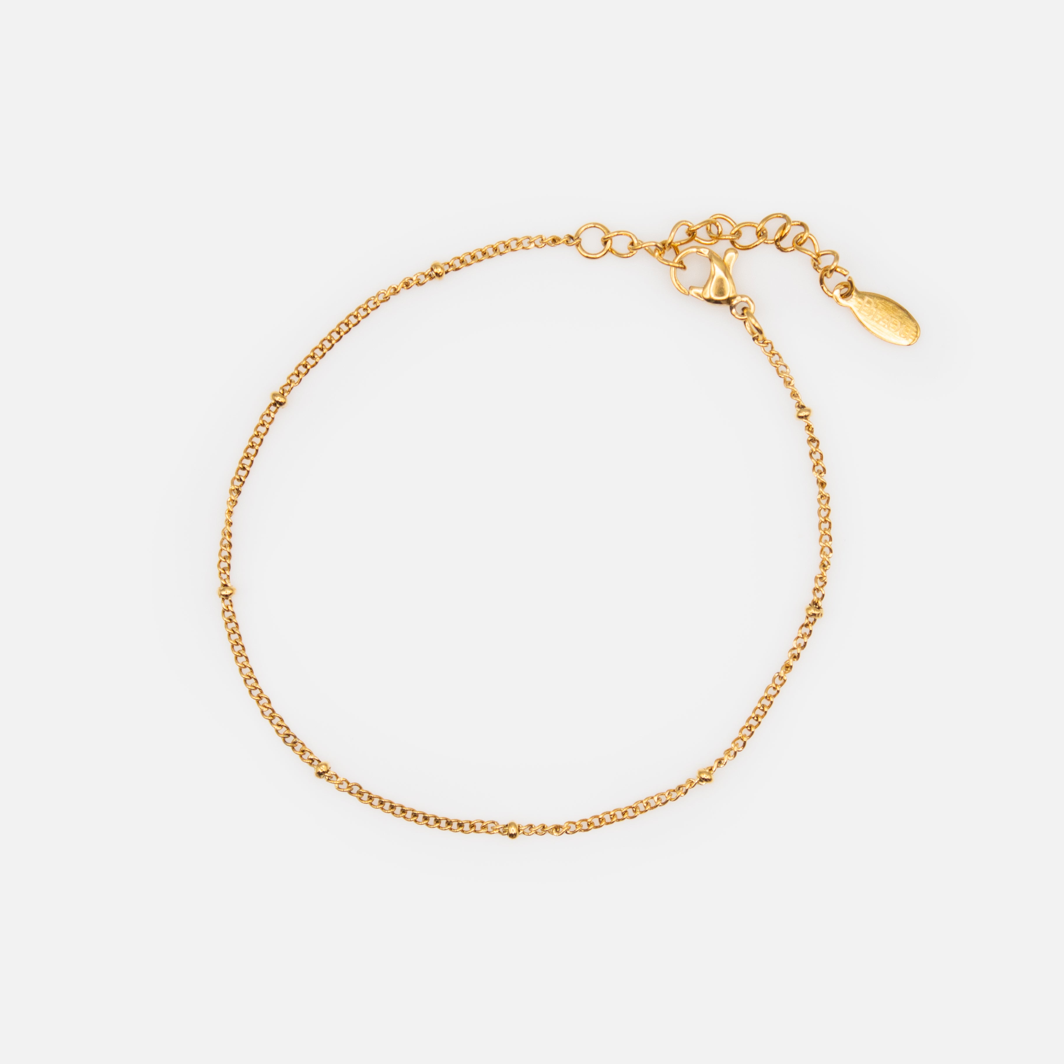Duo de bracelets dorés avec billes et insertions plates en acier inoxydable