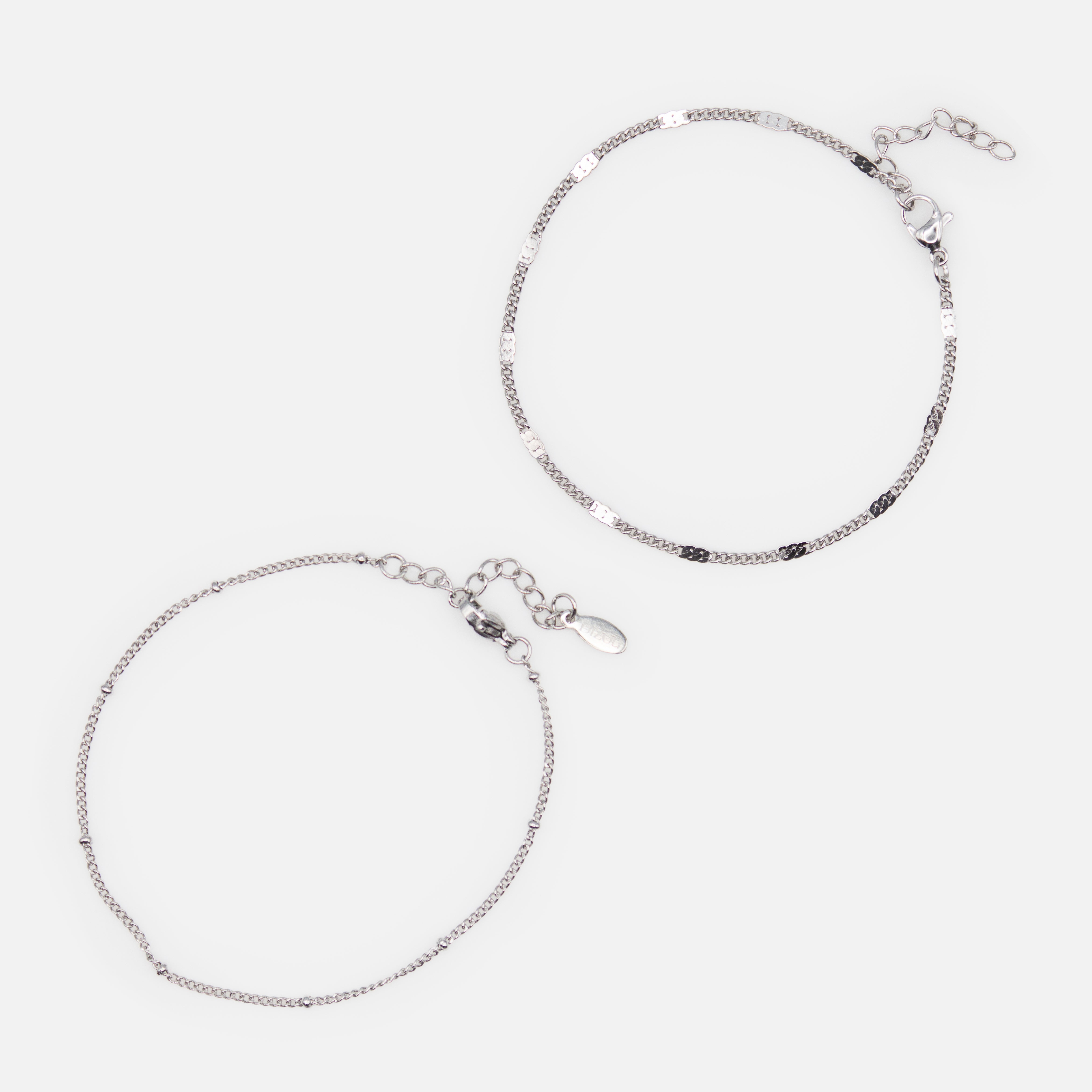Duo de bracelets argentés avec billes et insertions plates en acier inoxydable