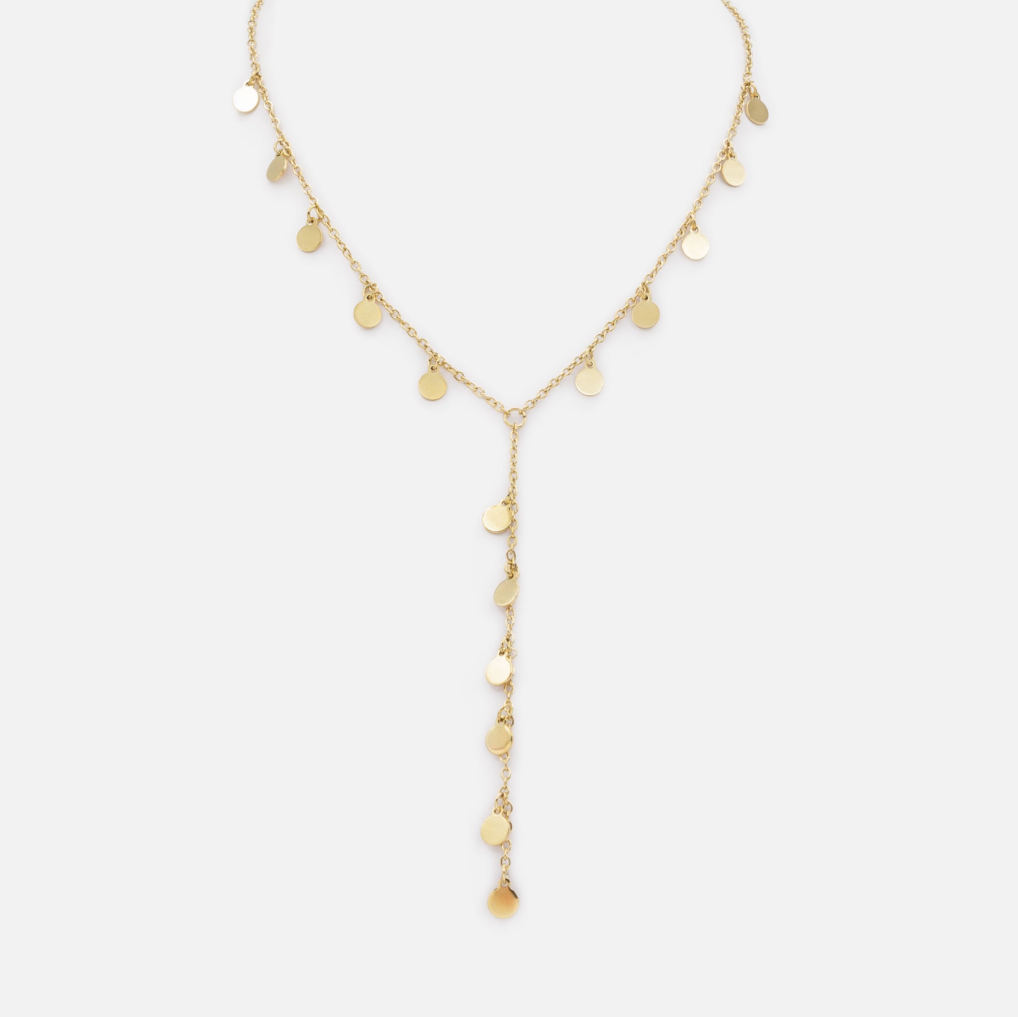 Gold necklace with round charms and long stainless steel pendant