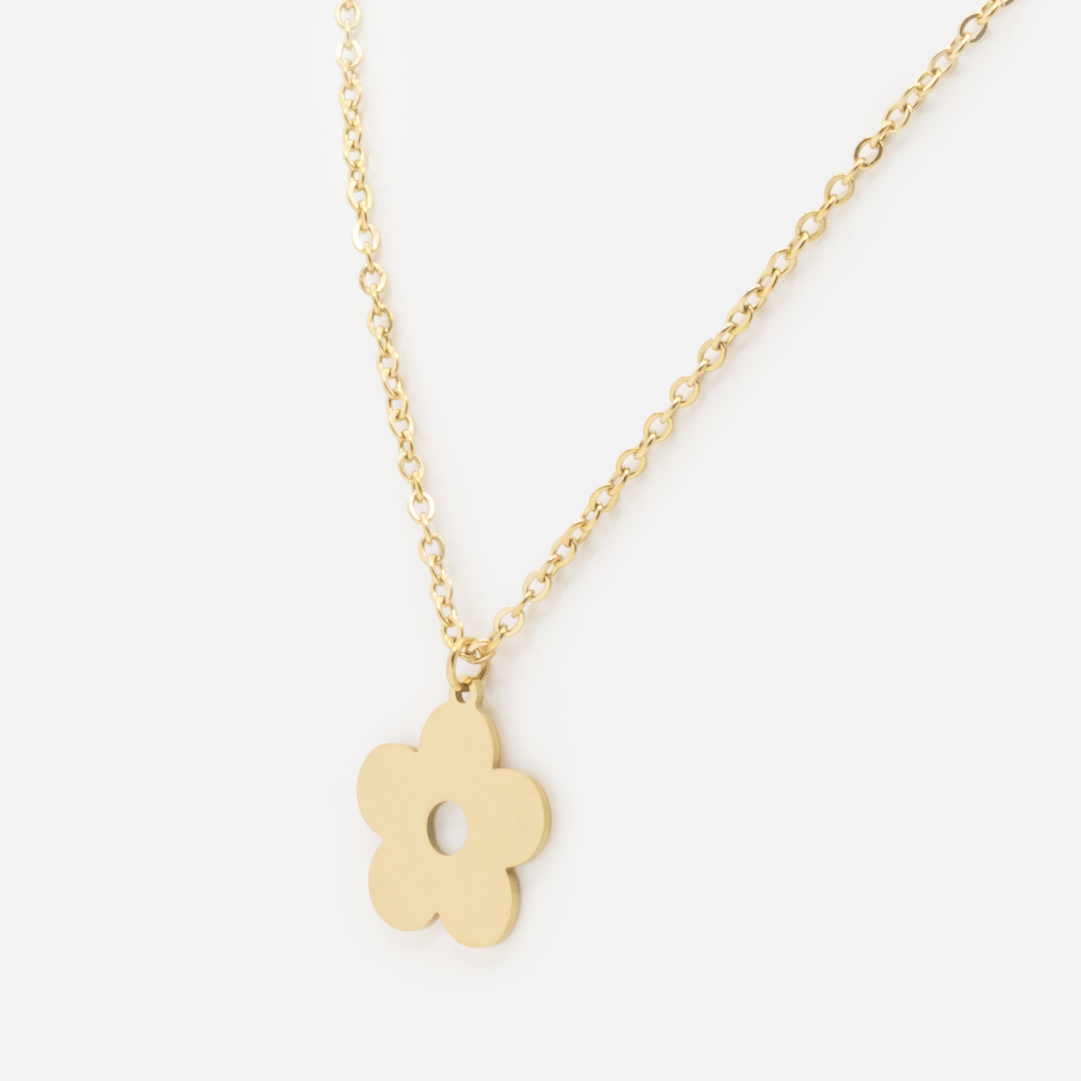 Gold necklace with stainless steel flower charm