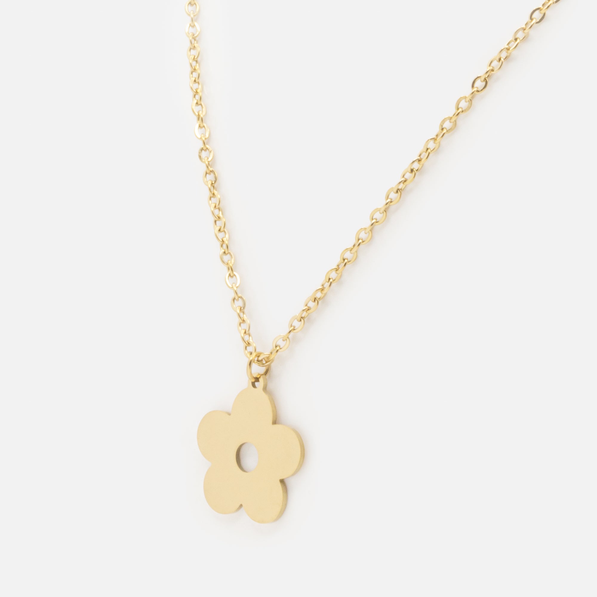 Gold necklace with stainless steel flower charm
