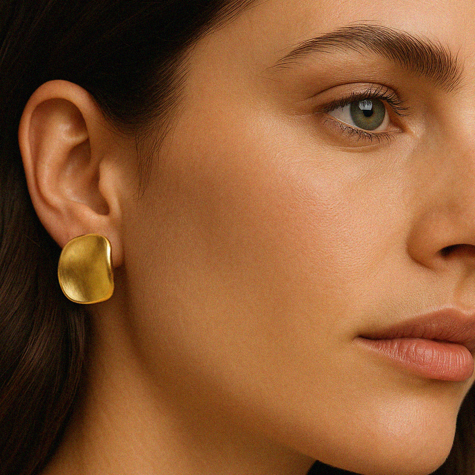 Curved gold stainless steel earrings
